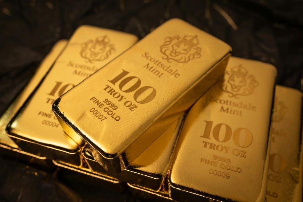 Precious metals such as Gold and Silver have been rising in price over the last 12 months as governments and people around the world are hedging their portfolios against weakening fiat currencies (Scottsdale Mint / Unsplash)