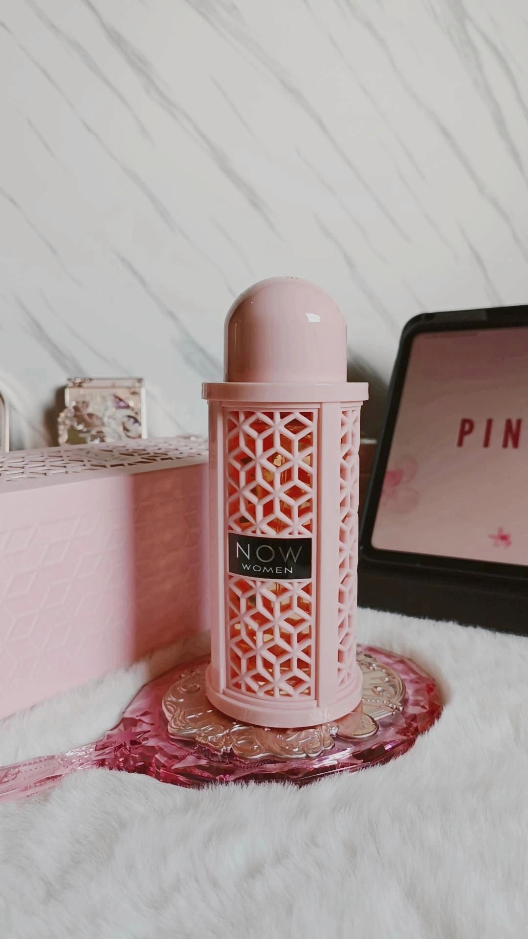 Now pink perfume bottle
