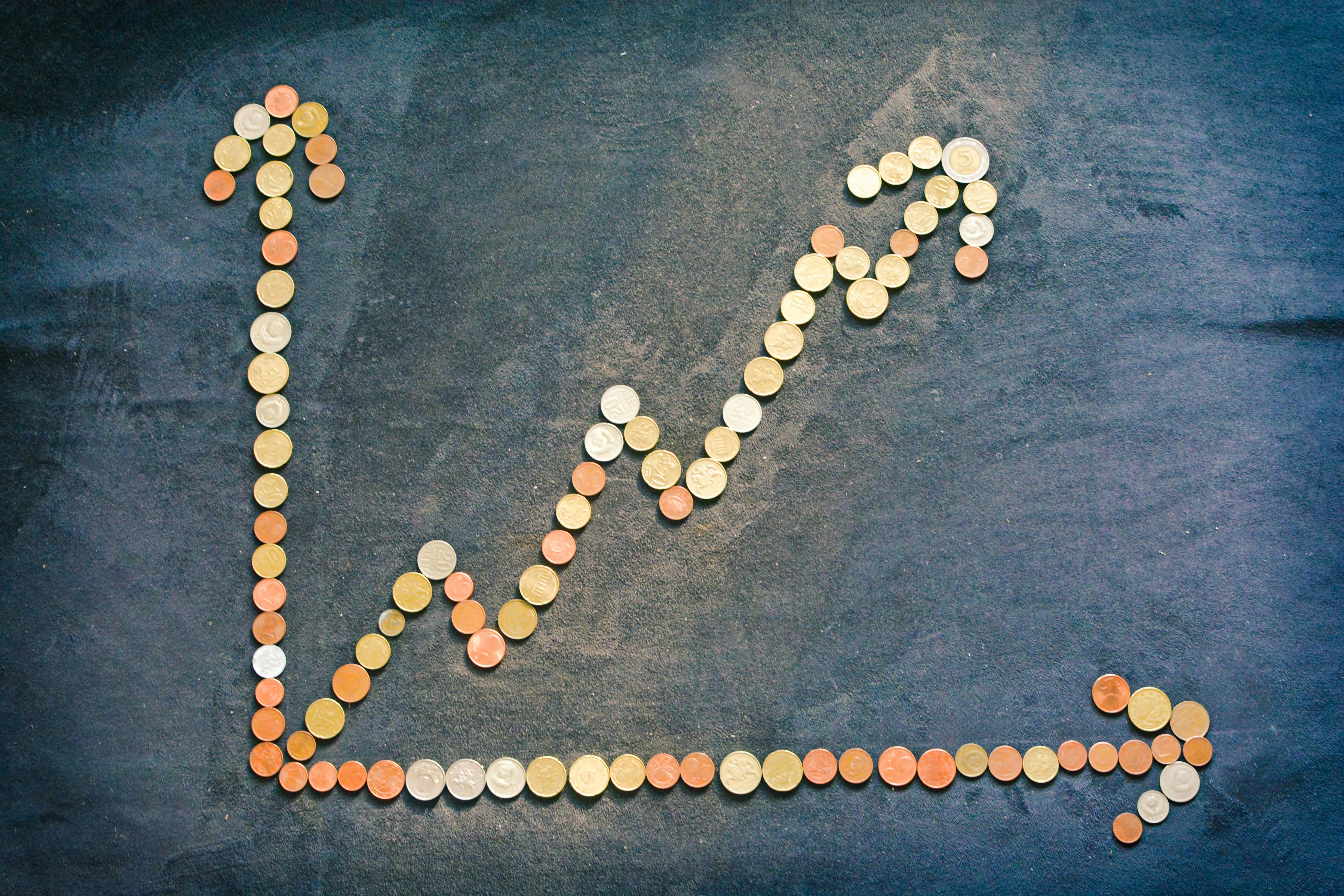 an-upward-trend-graph-made-from-coins-representing-financial-growth-and-success. - aurelijus-u. (pexels)