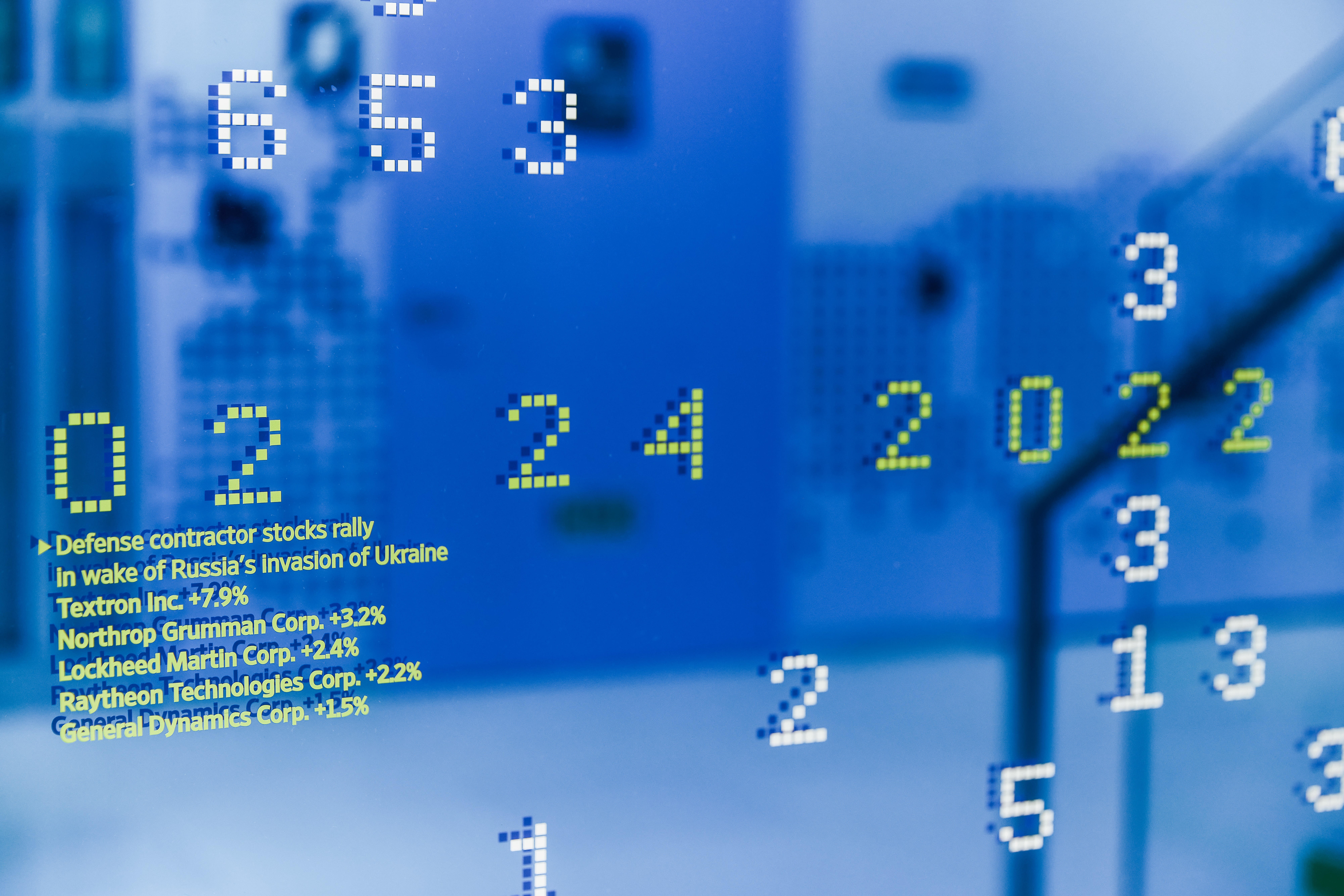 Streetside billboard with flyposters of the Batch.Works brand and illustrations