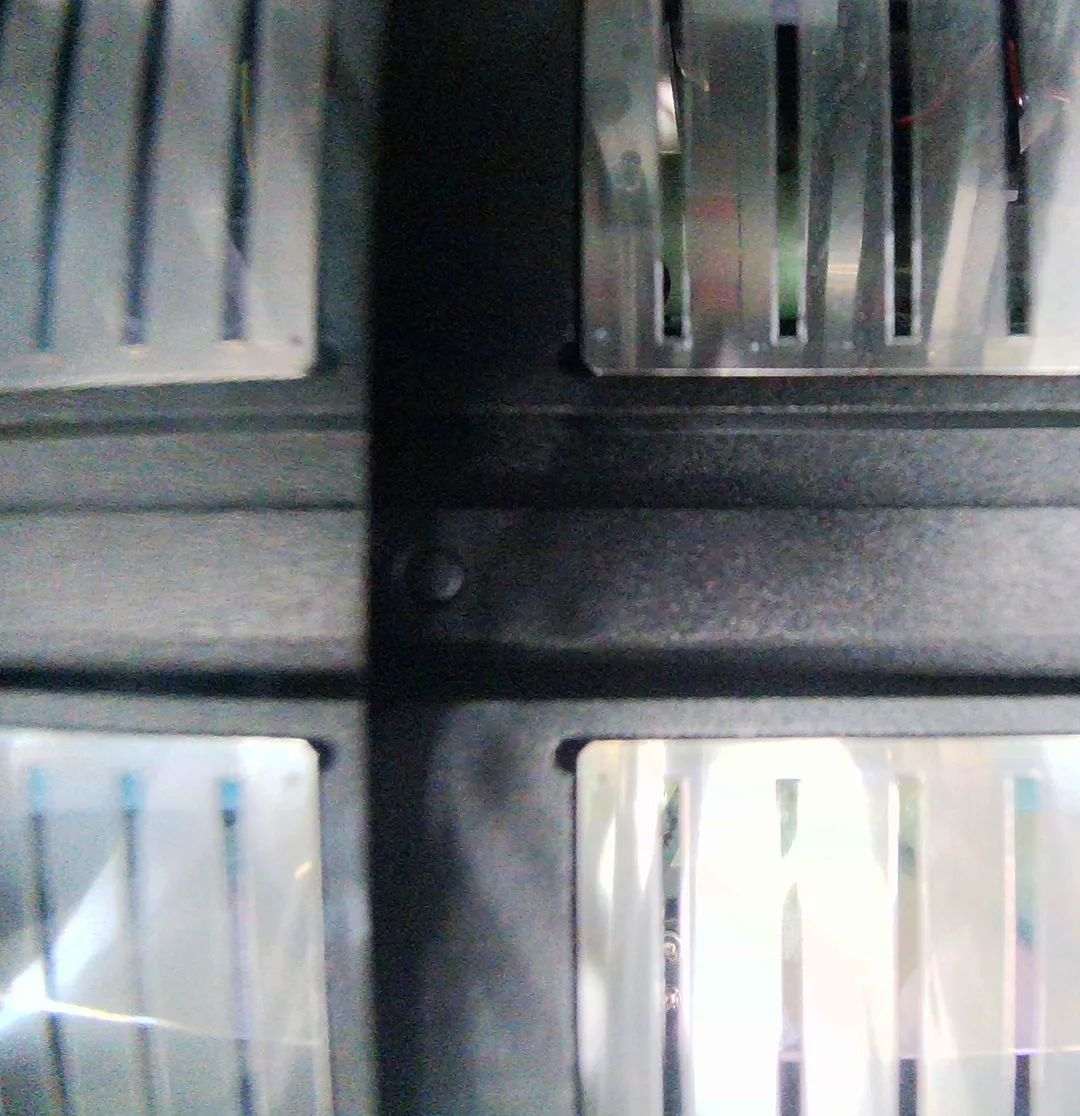 Internal nozzle inspection viewpoint of the Manprotek Gravity Pro DTF printer, showing the precision-aligned print head components for quality control.