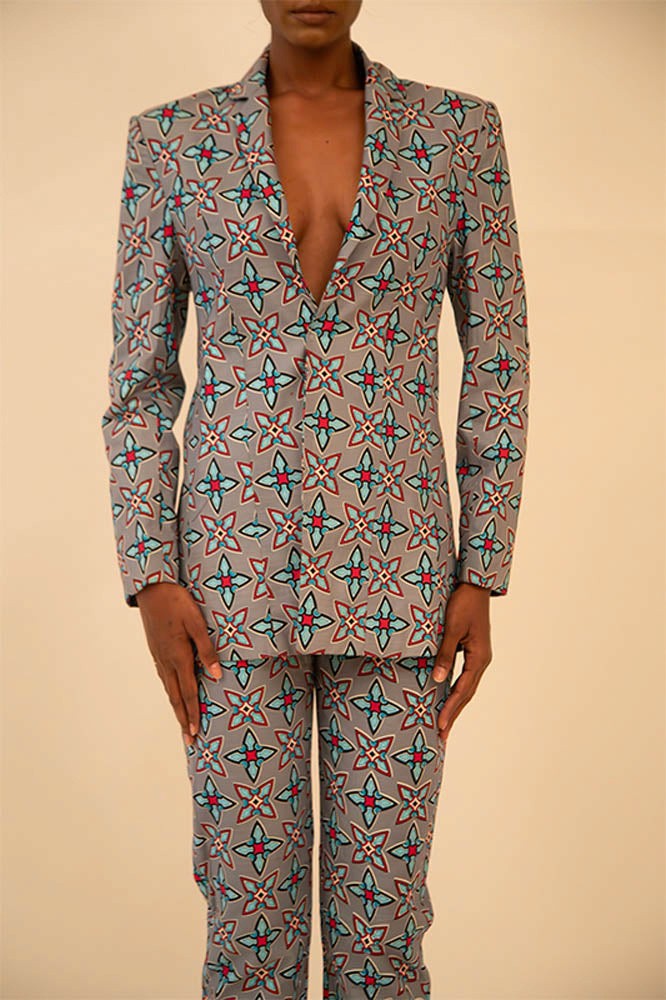 Vintage abstract print oversized blazer and pant set featuring a relaxed fit and bold coordinated design, thrifted from global vintage collections.