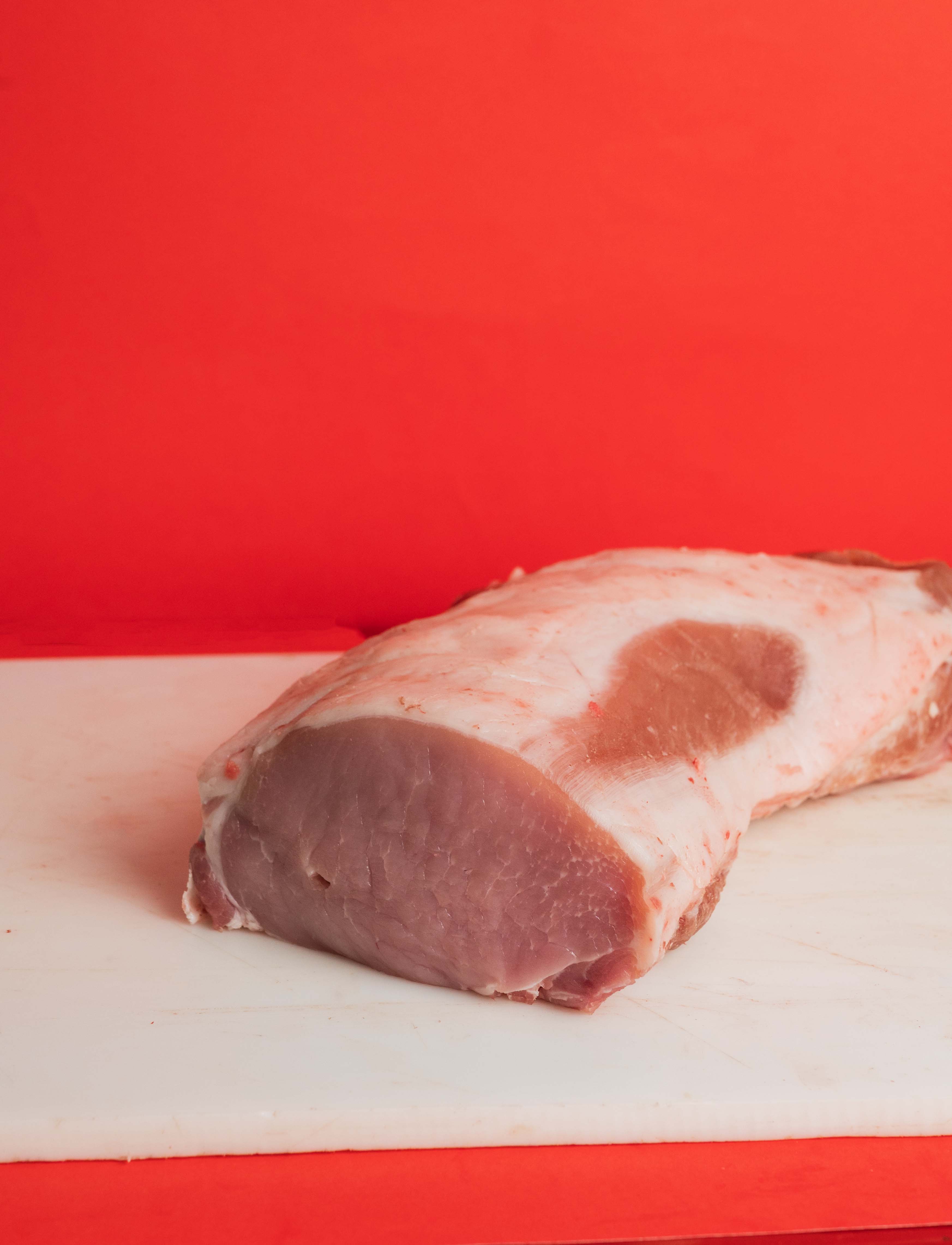 raw meat on brown wooden table
