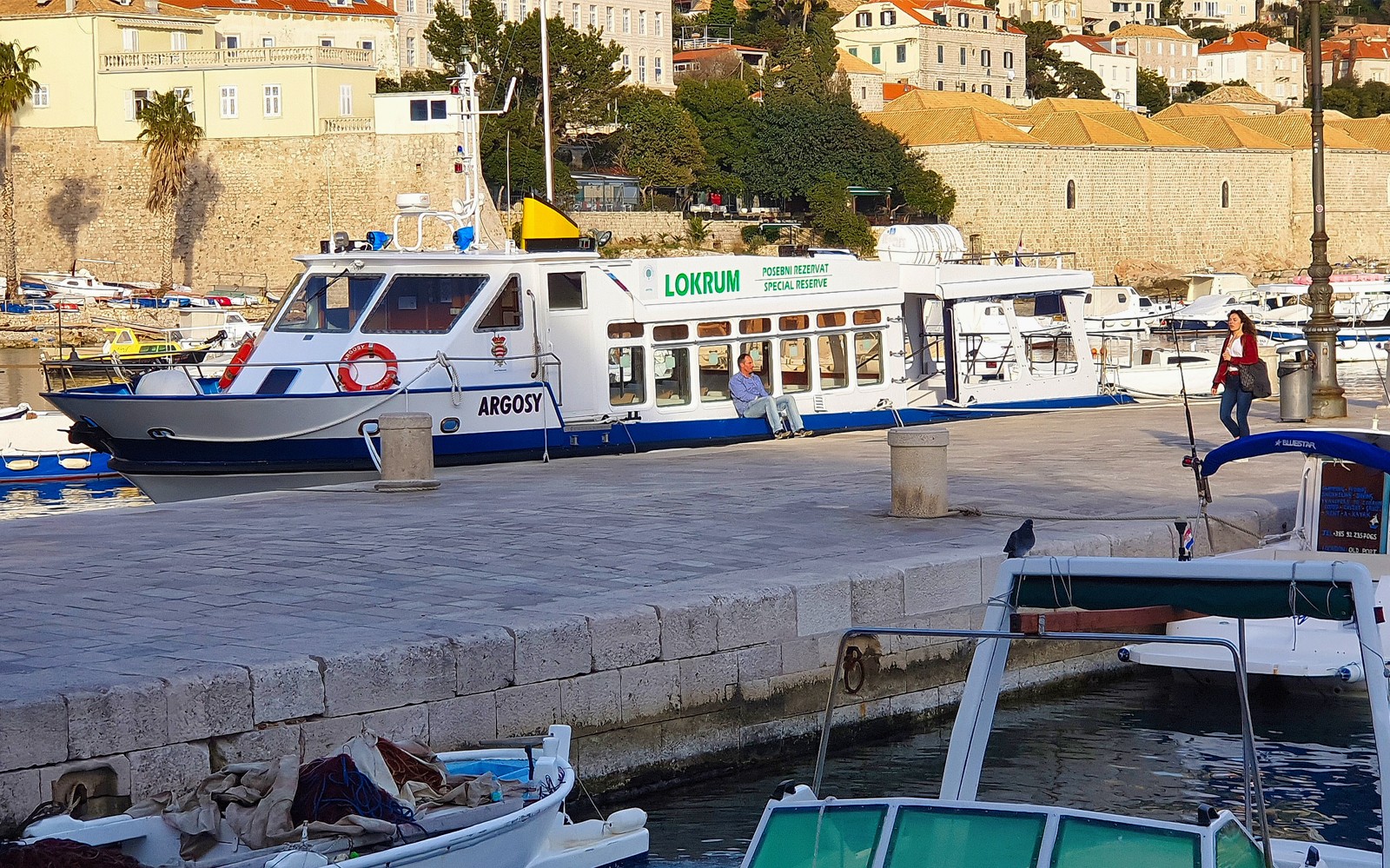 Boat docked in Dubrovnik harbor for Game of Thrones tour.