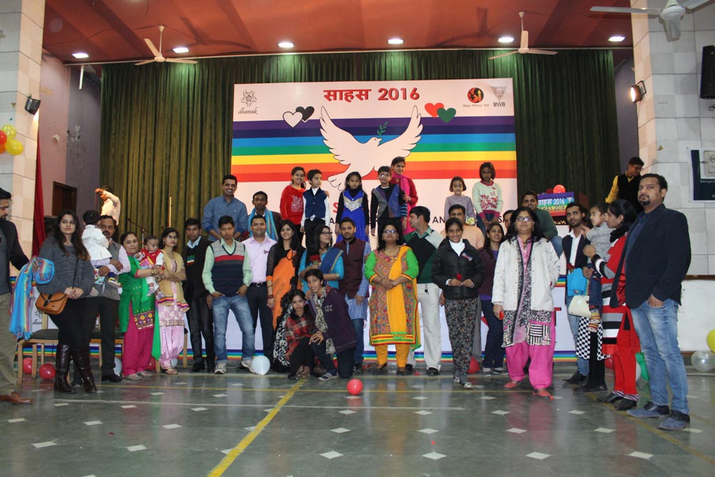 Close-up of vibrant purple flowers with droplets of water, creating a rich, textured background.