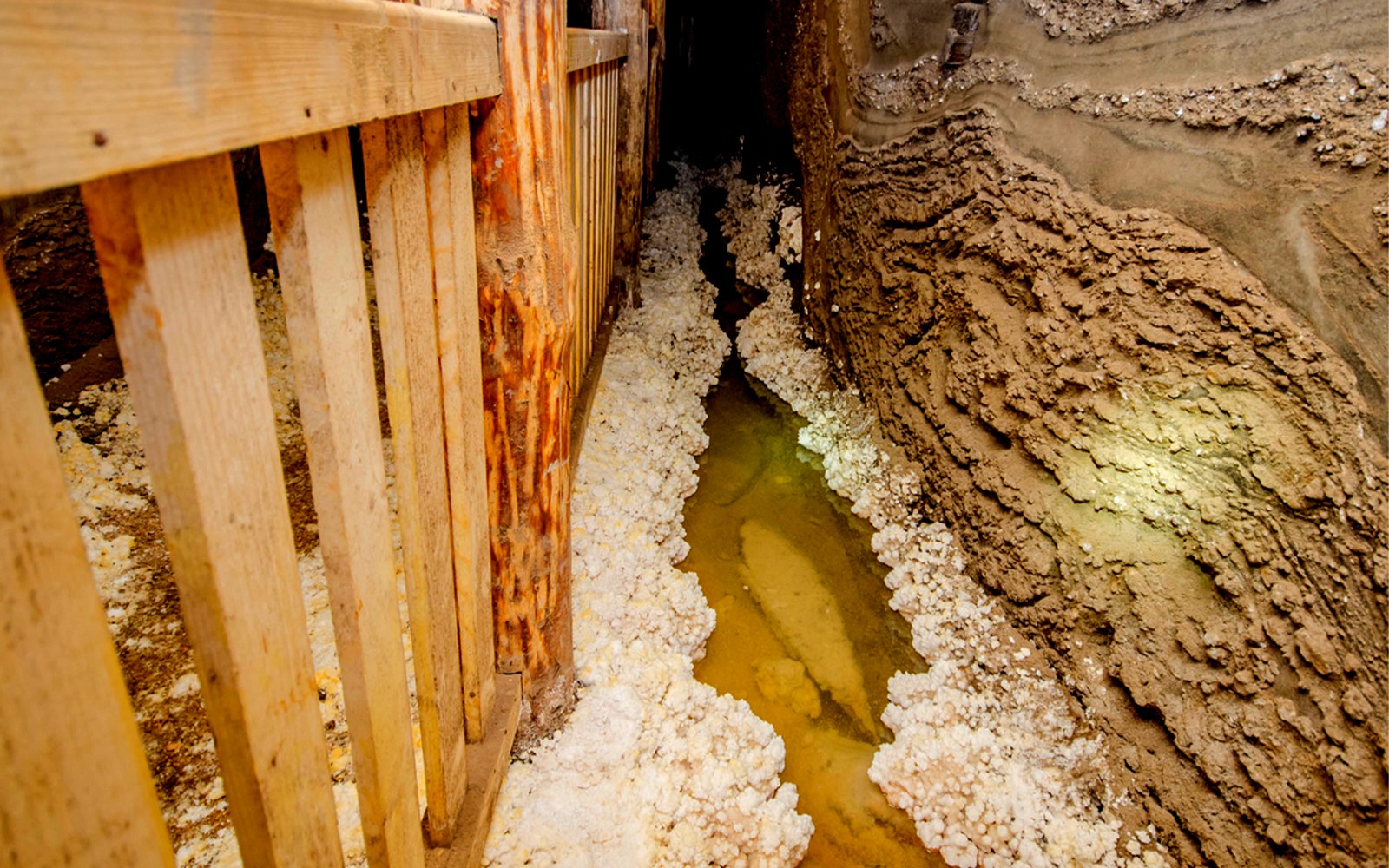 Underground passage with salt deposits in Bochnia Salt Mine, Poland.