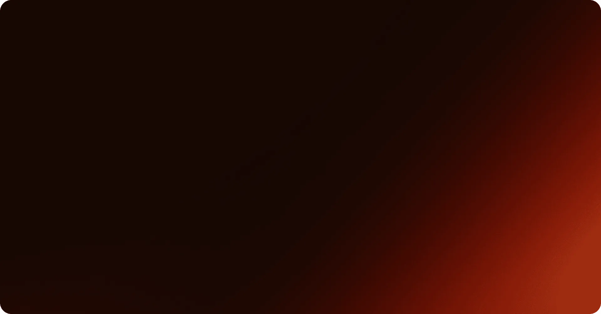 A blurred image with a vibrant red and orange background, creating an abstract and warm visual effect.