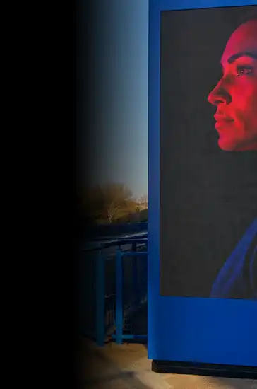 Outdoor portrait digital signage display in a commercial environment
