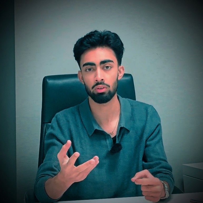 A professional headshot of Nischal Poudel for his portfolio website in his home page