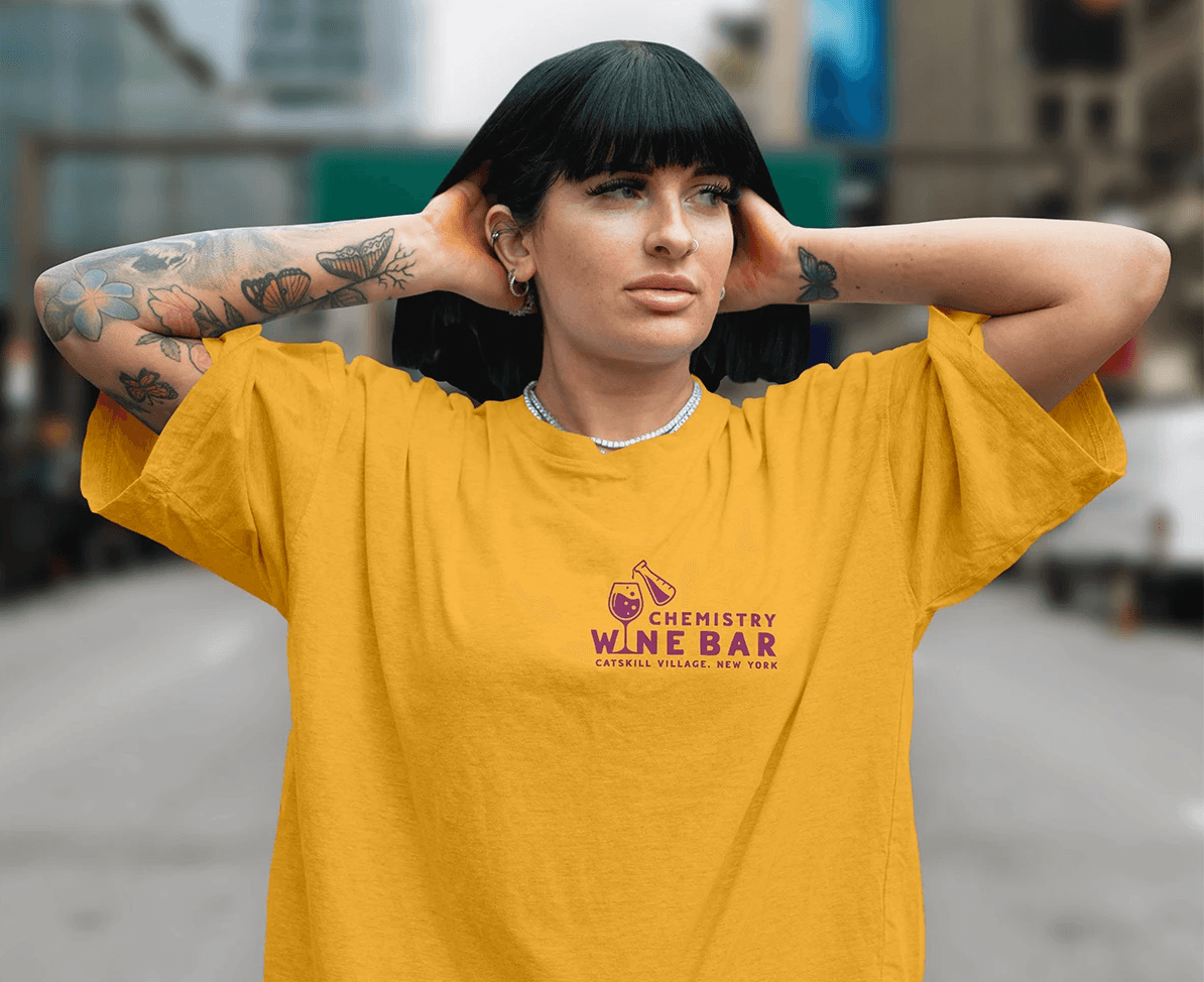 Graphic design mockup of t-shirt for Chemistry Wine Bar — bold, wordmark style logo with decorative sans serif typography, designed by Will Lefkovich.