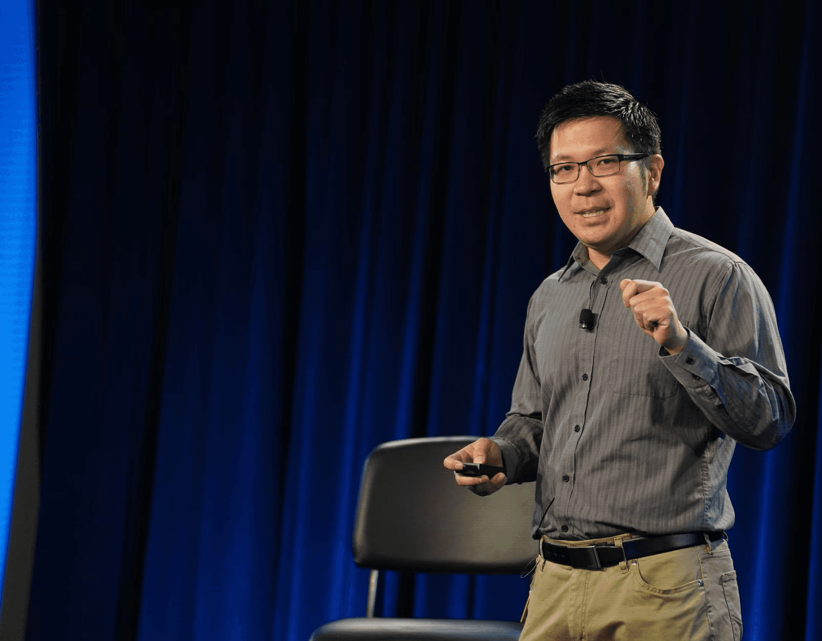 Image of Wainwright Yu giving a speech on stage