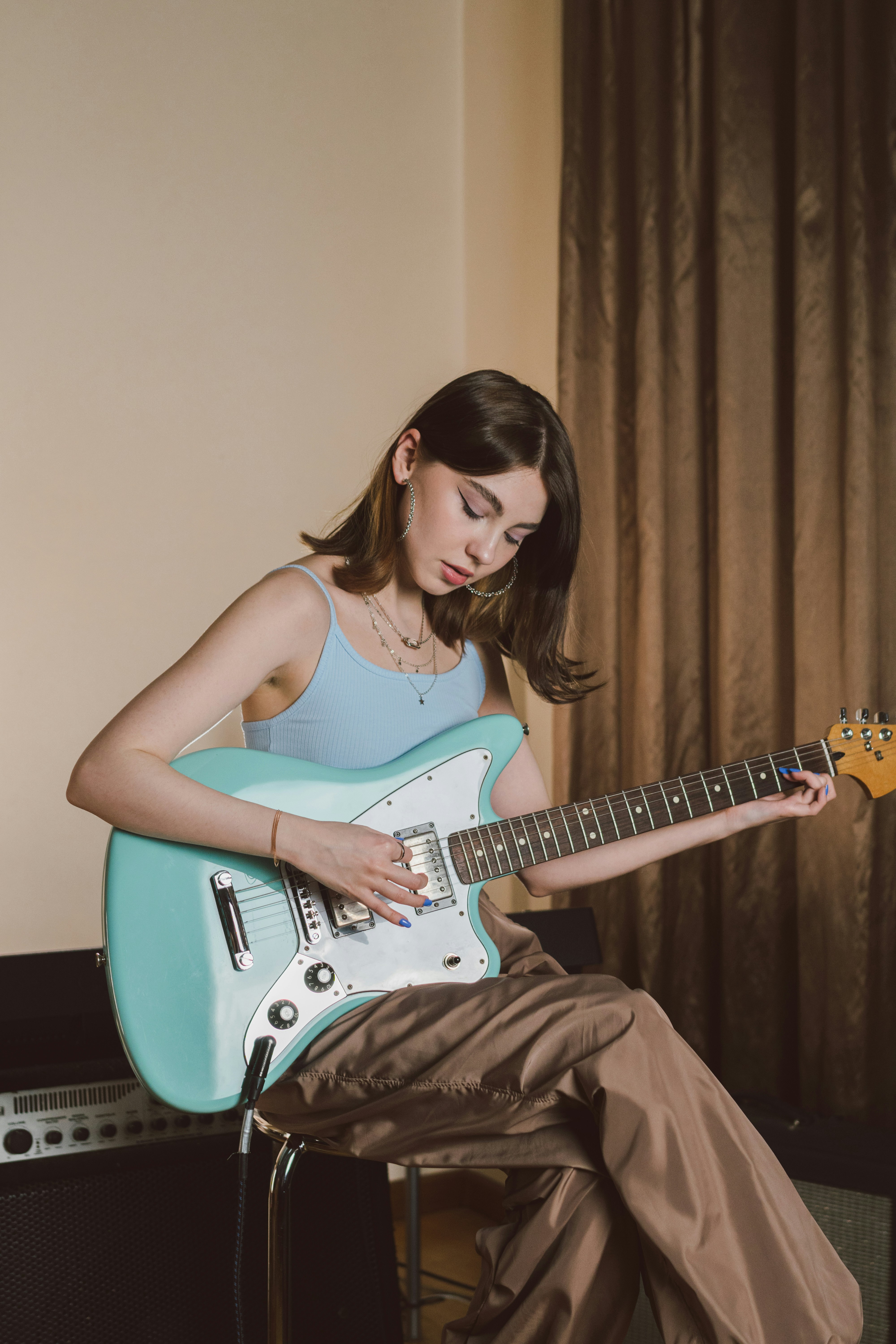 girl playing guitar