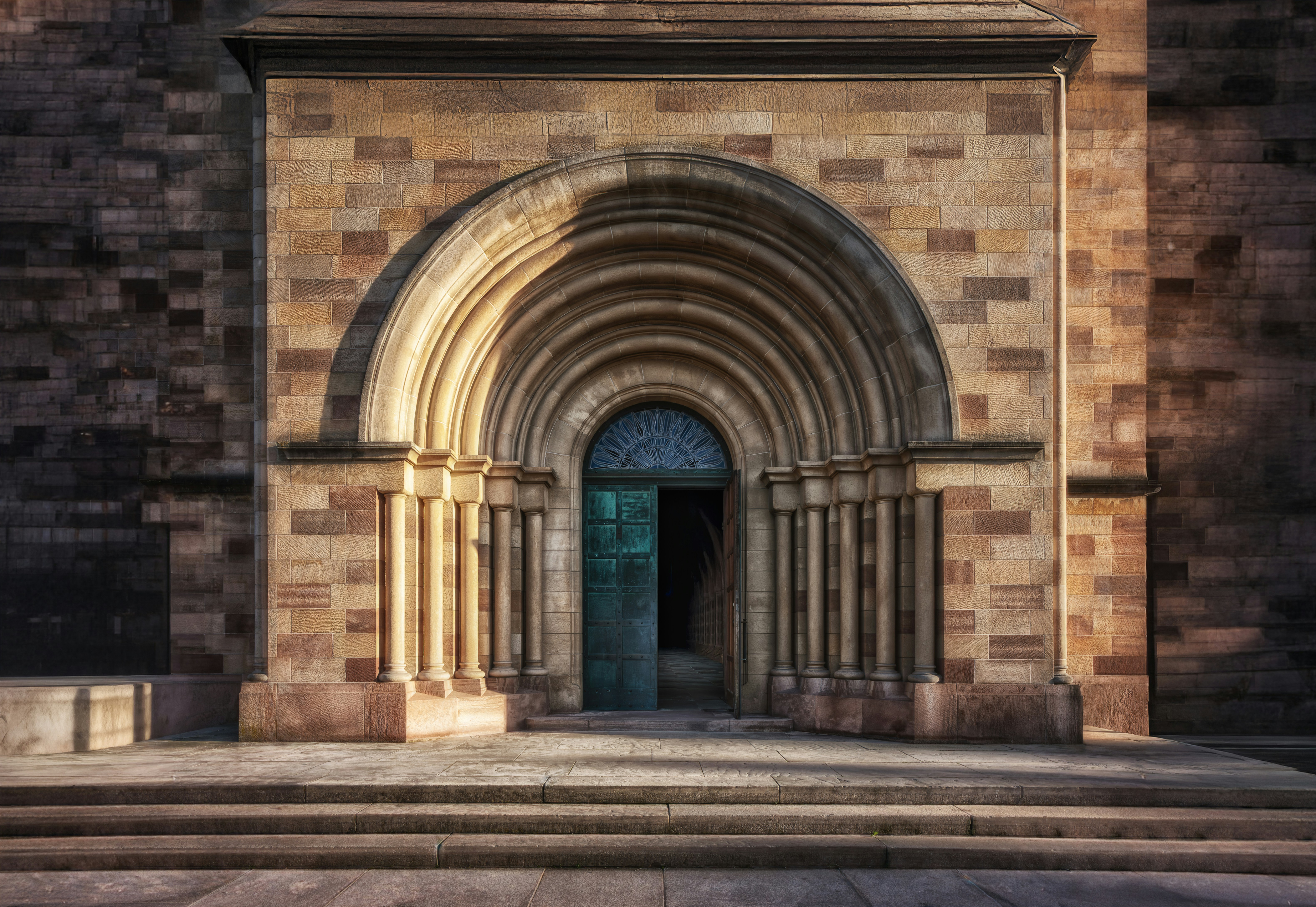 Arched doorway of an old stone building