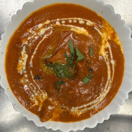 Butter Chicken in creamy tomato gravy at Ustaad G76 Surrey Central