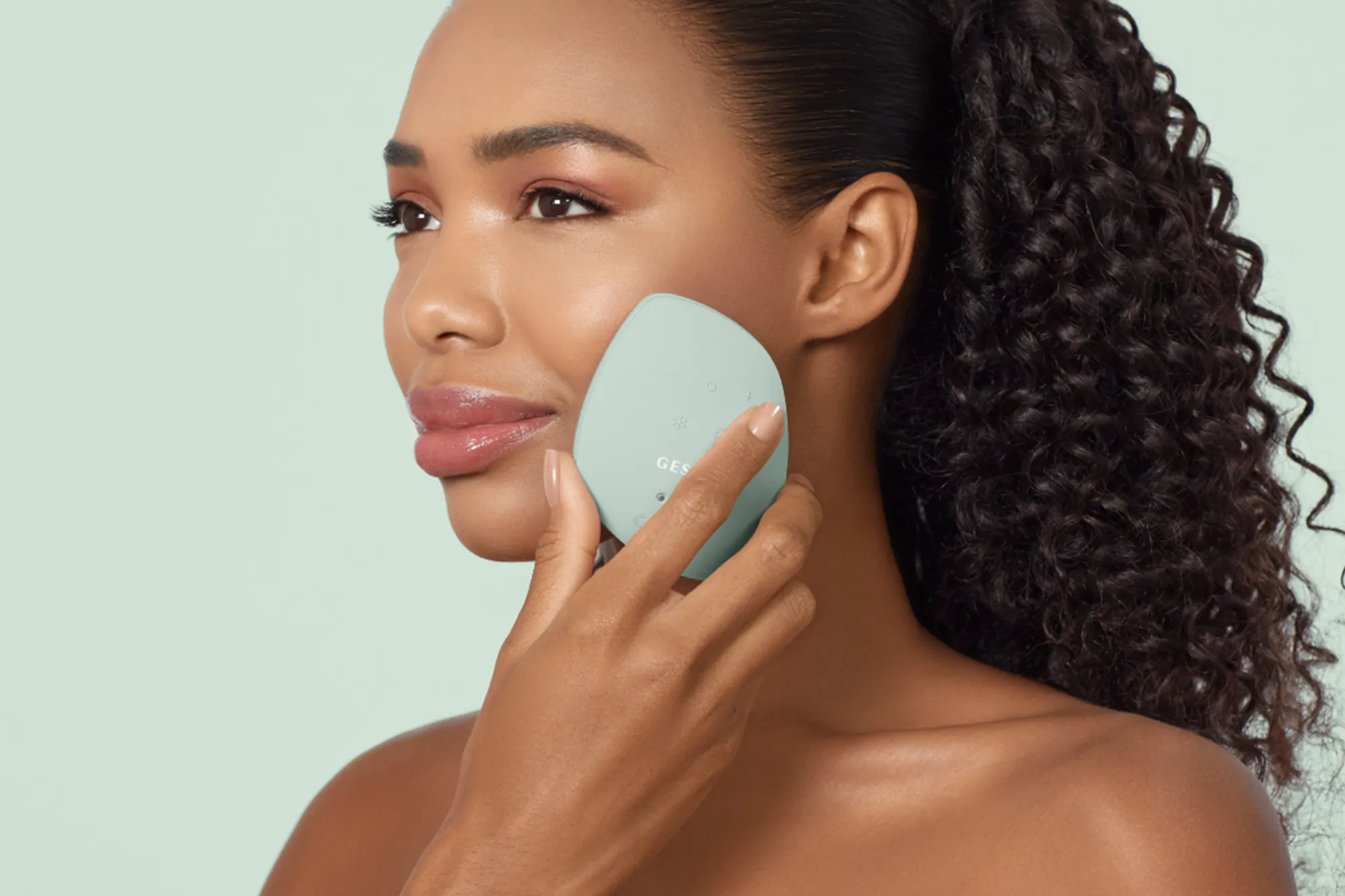 Streetside billboard with flyposters of the Batch.Works brand and illustrations