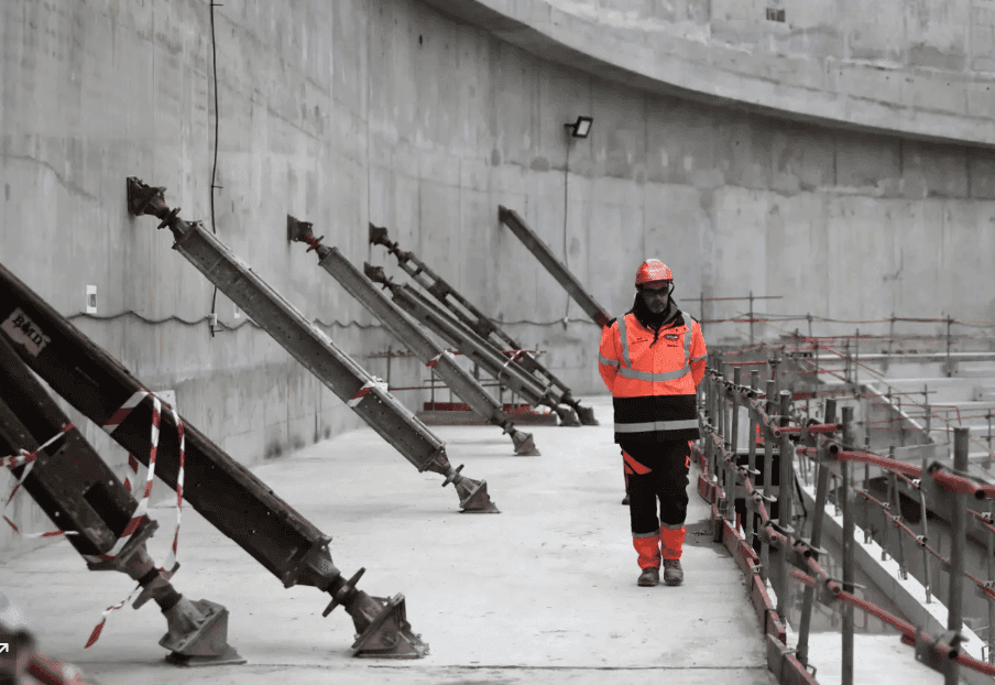 Worker walking in a construction site