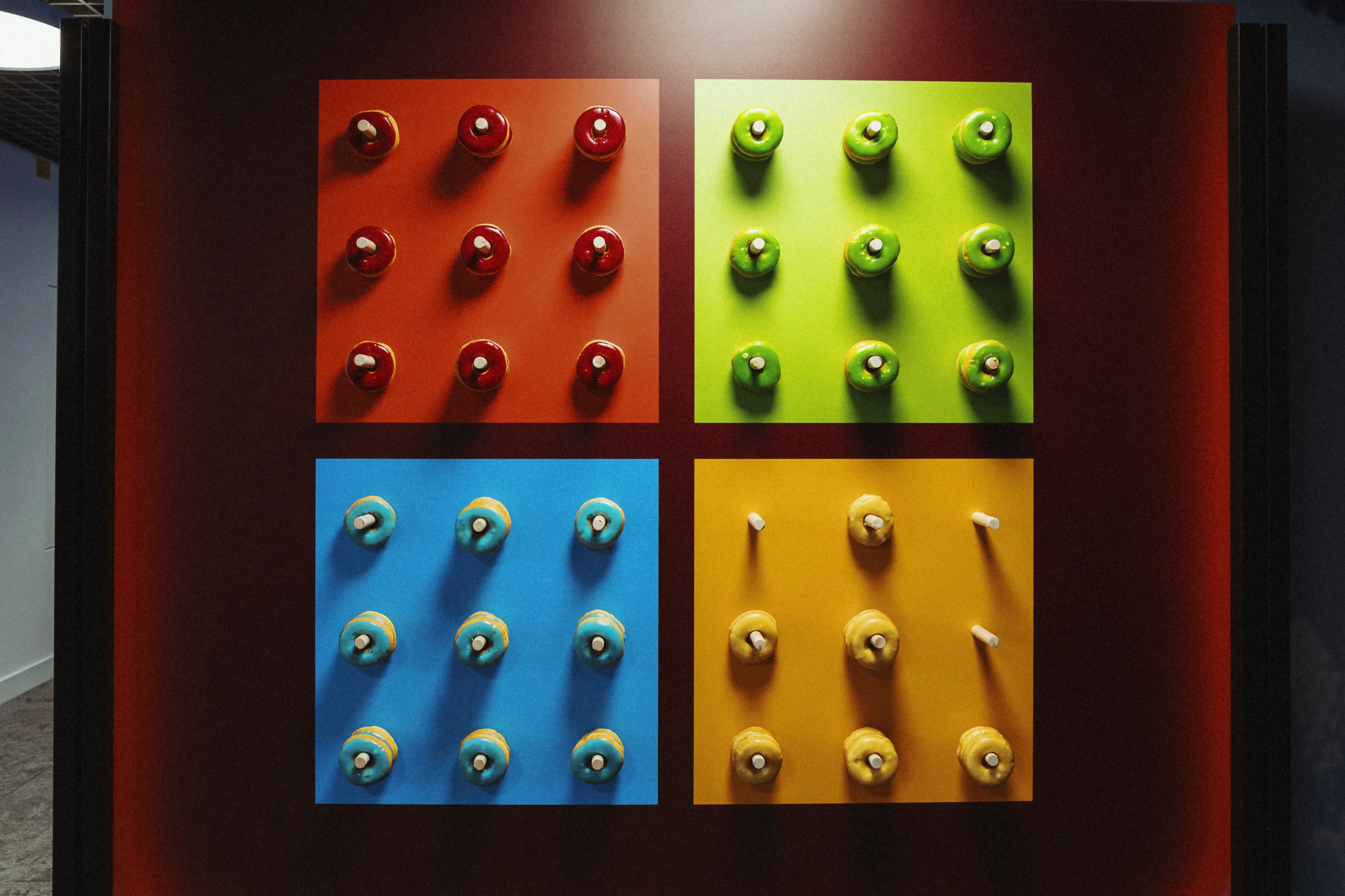 Streetside billboard with flyposters of the Batch.Works brand and illustrations