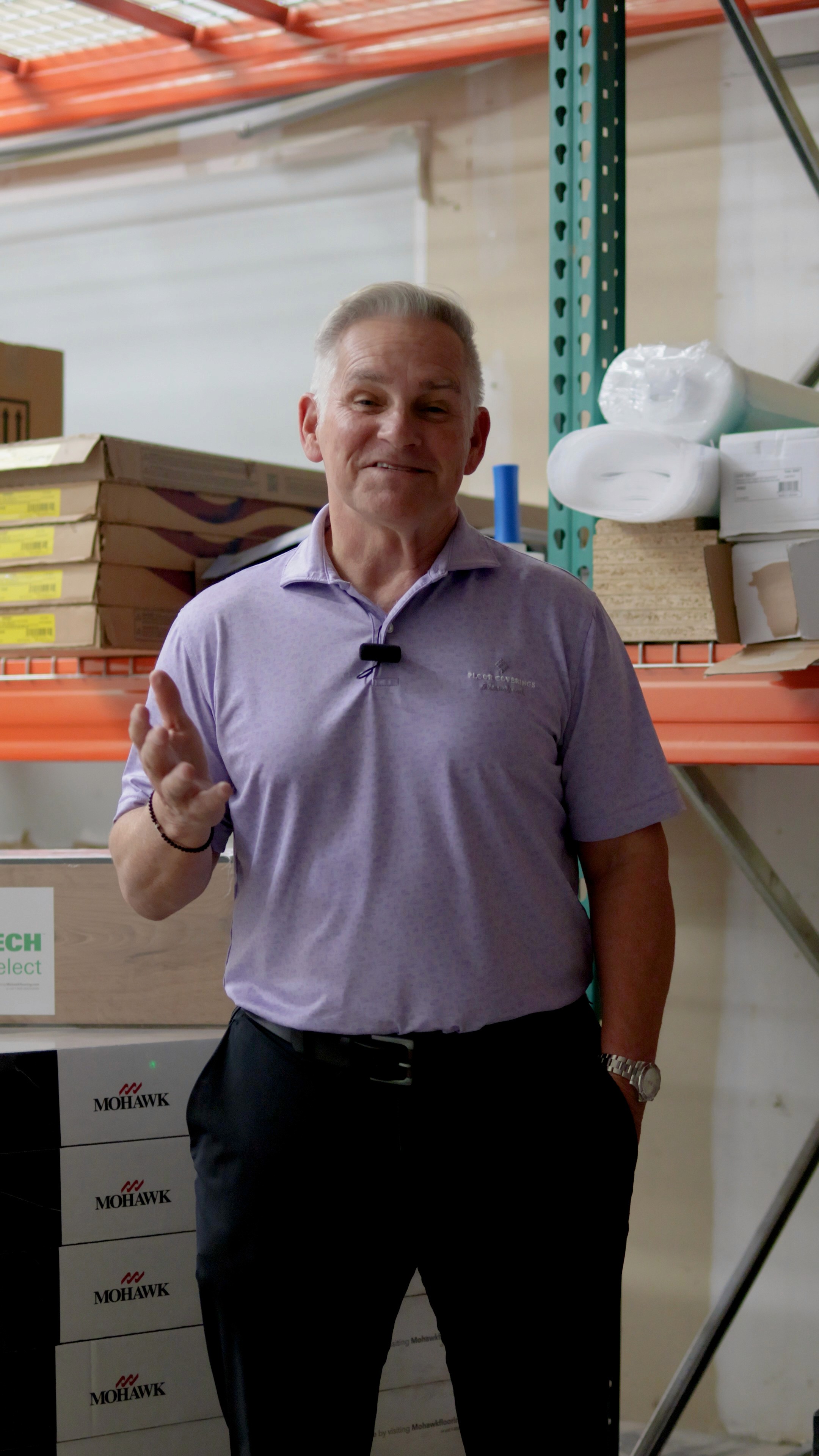 Close-up of a tree stump showing growth rings and a textured brown wood surface.