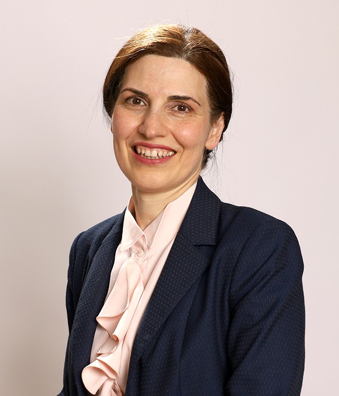 Dr. Neda Maria Kaizumi speaking about ethical AI leadership