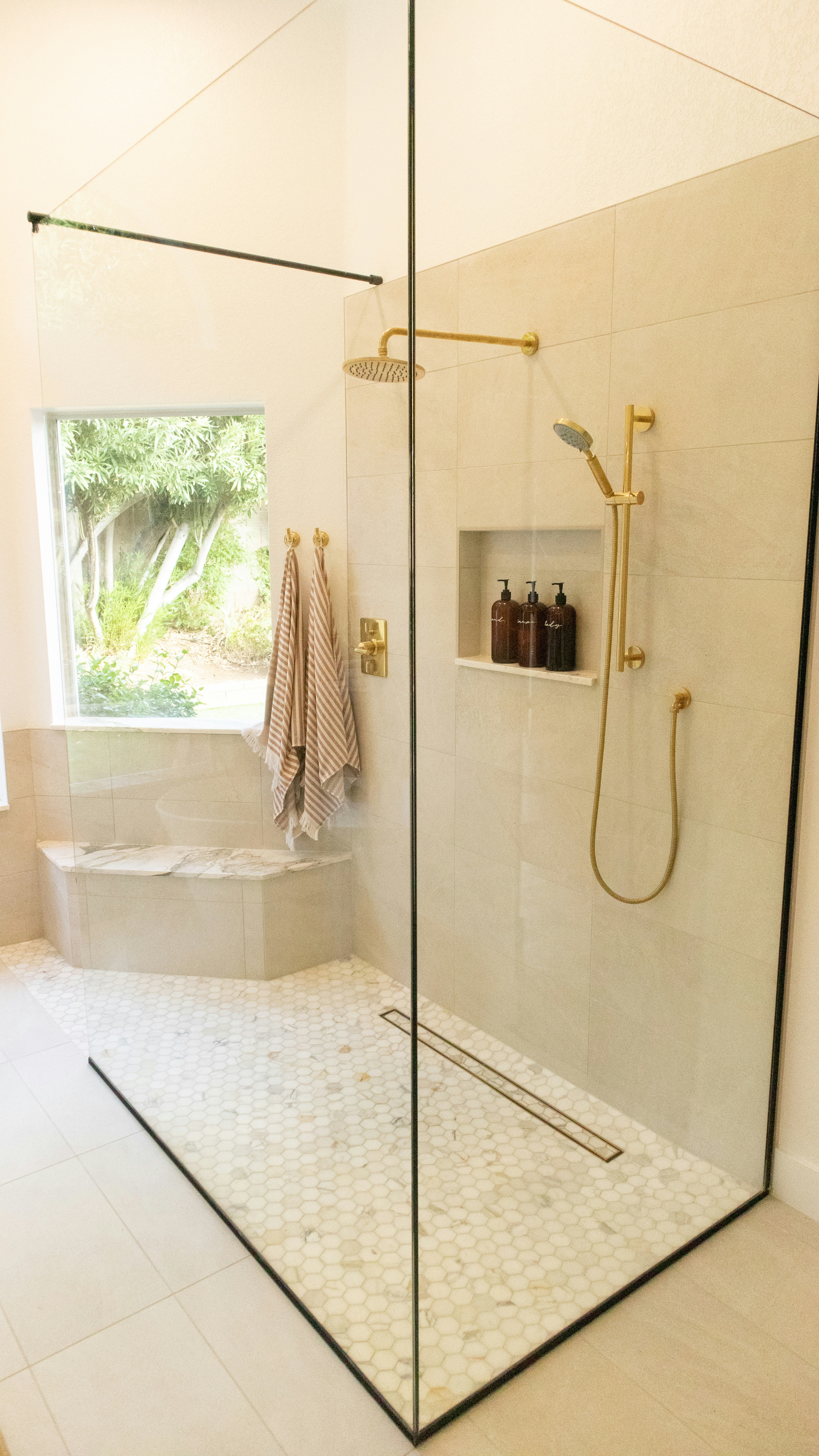 Bathroom with clear glass door.