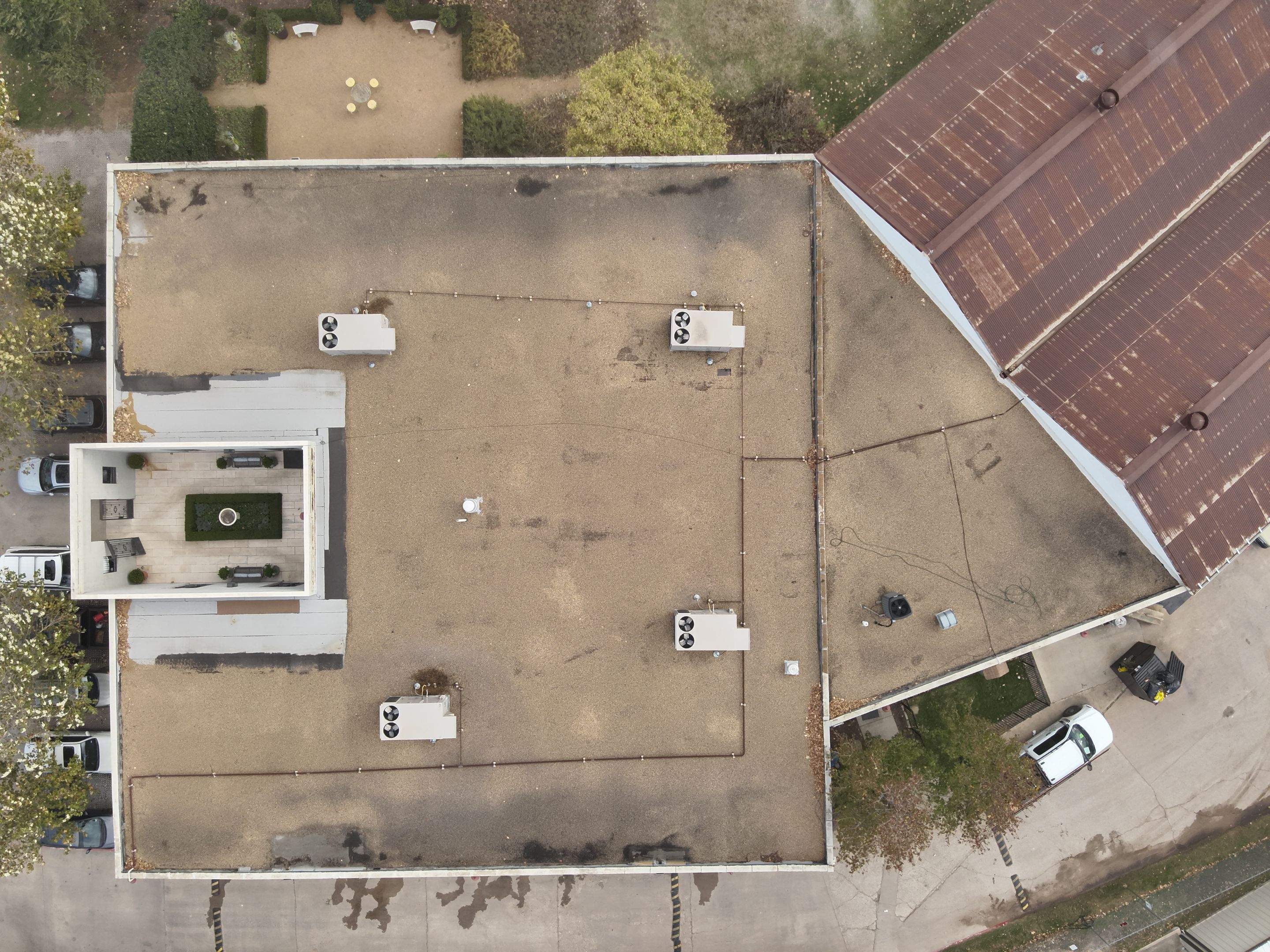Drone shot of the company building before any work was done with a birds eye view
