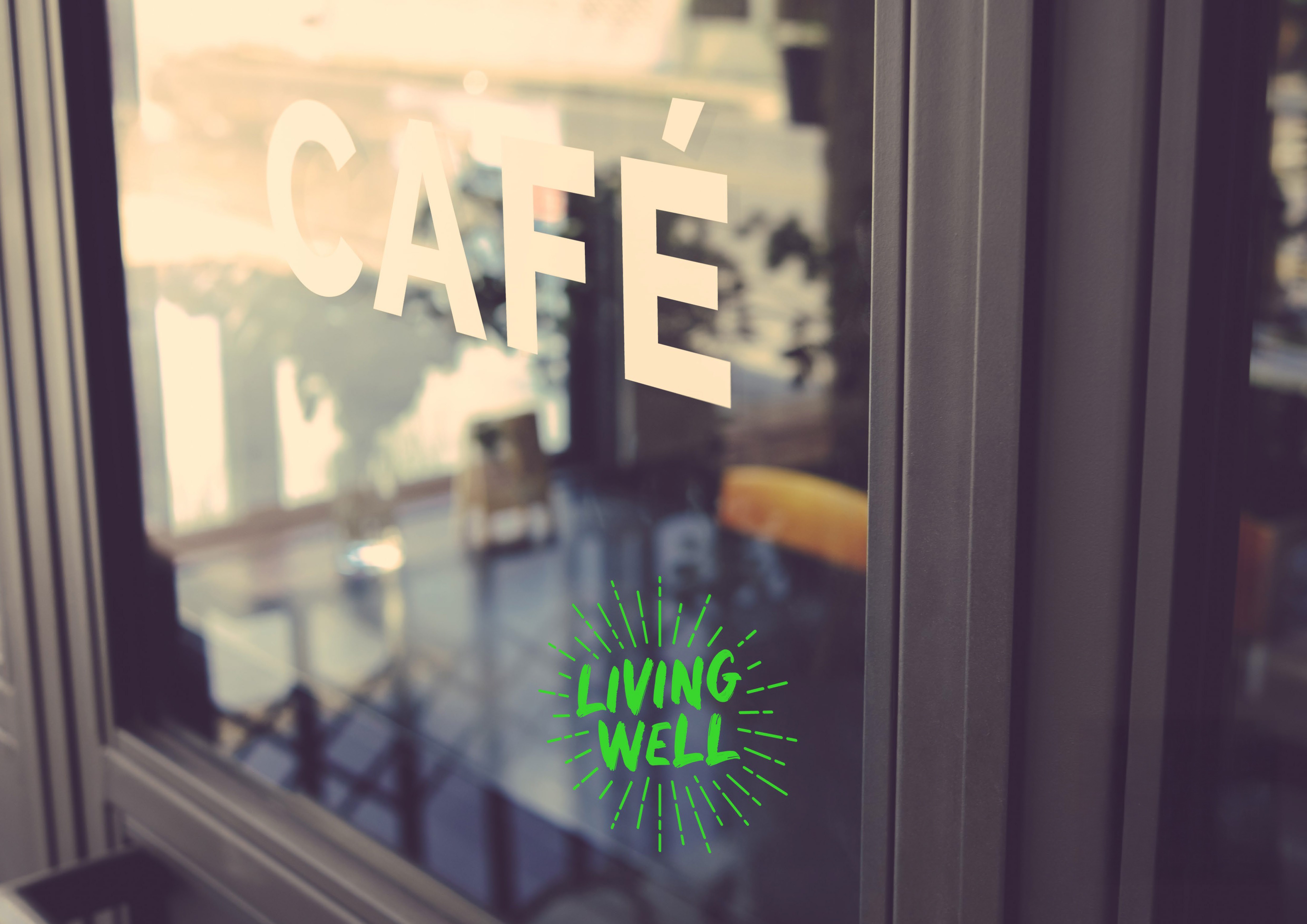Living Well logo in cafe window