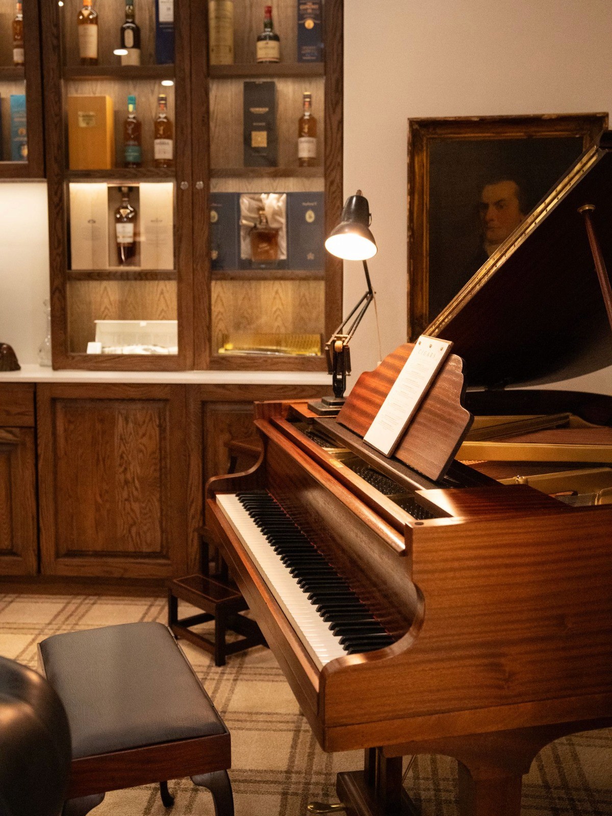 The wedding backdrop is the open sea, shimmering under late afternoon light