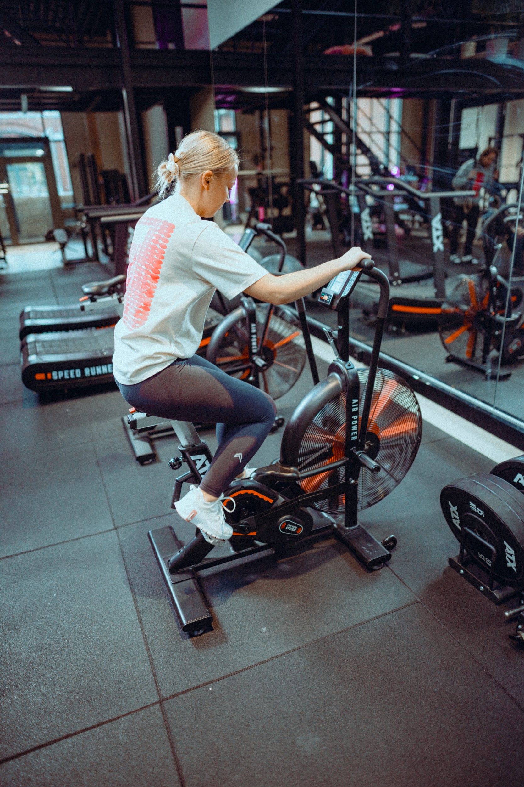 Person cycling on an assault bike