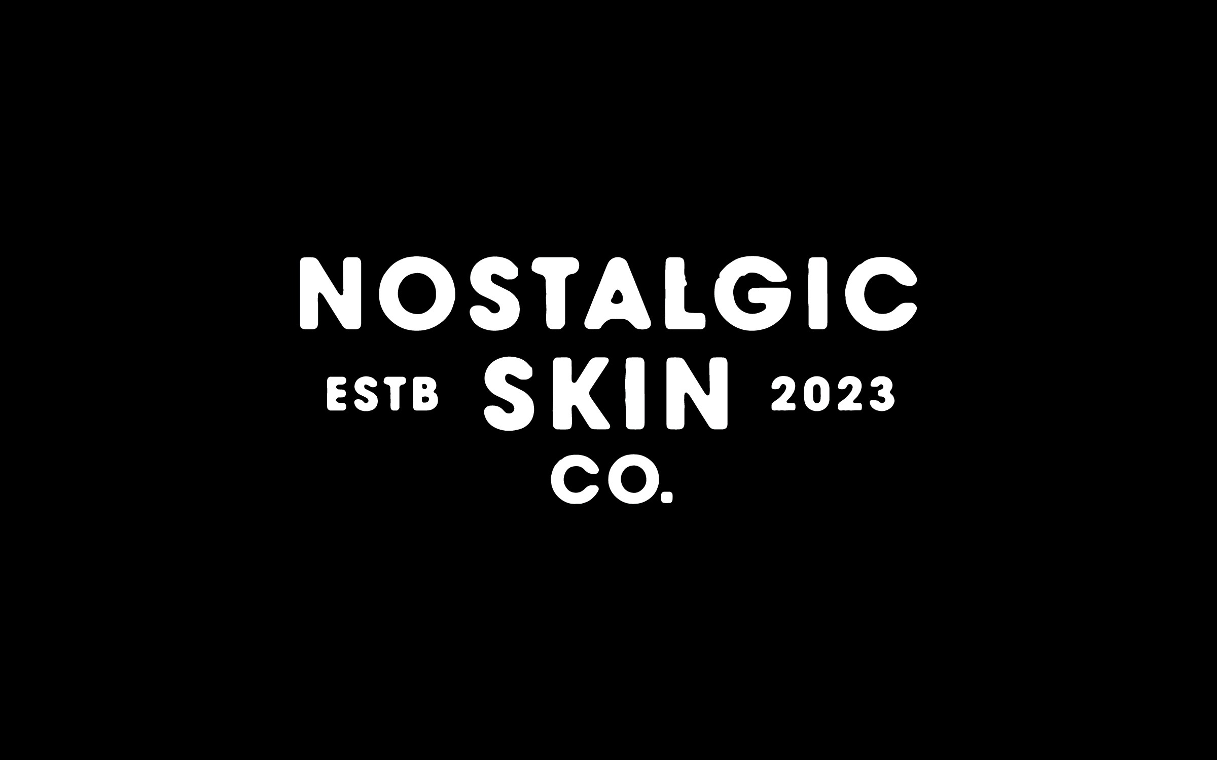 Nostalgic Skin Co. stacked logo in white on black background