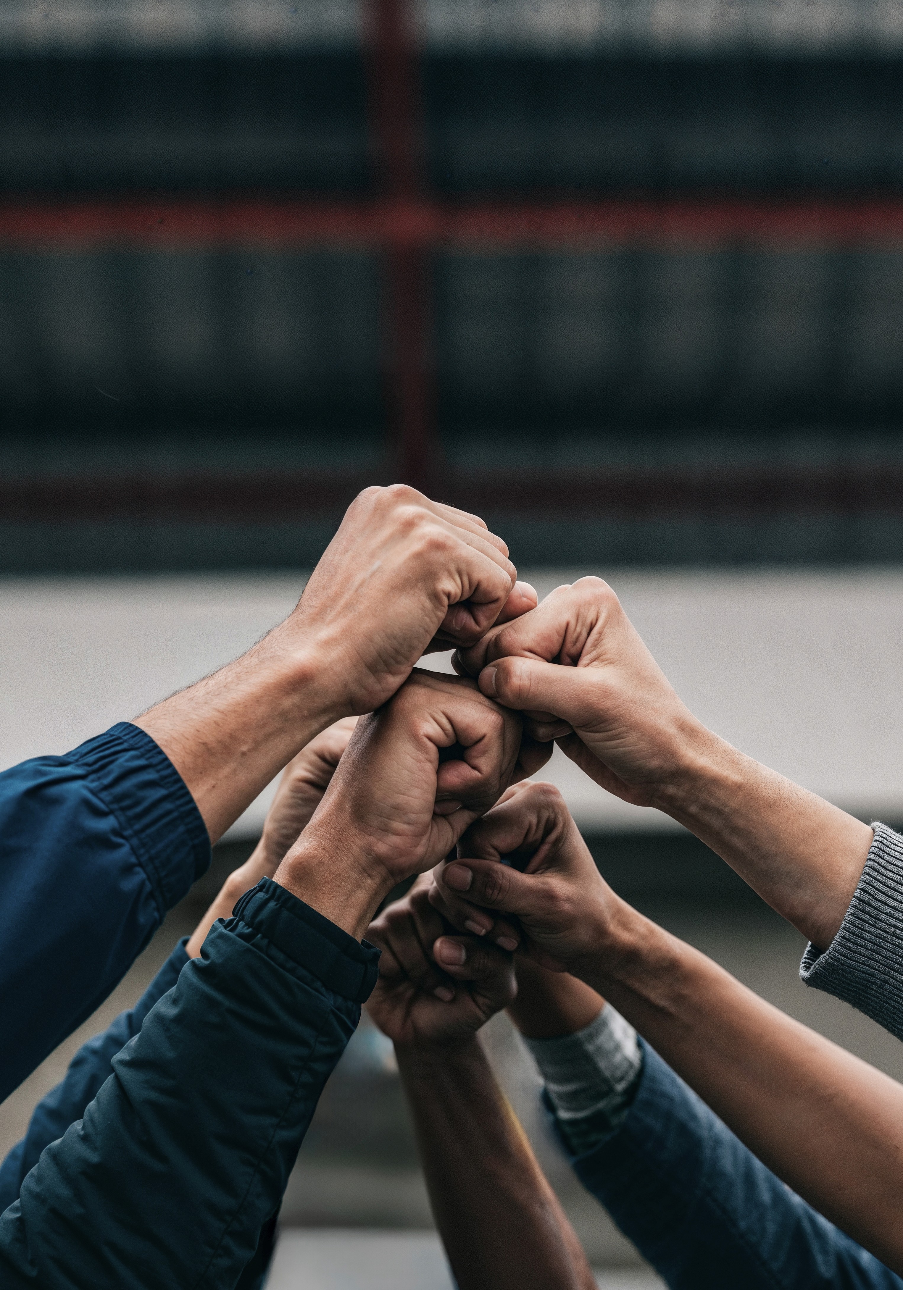 two men using MacBooks