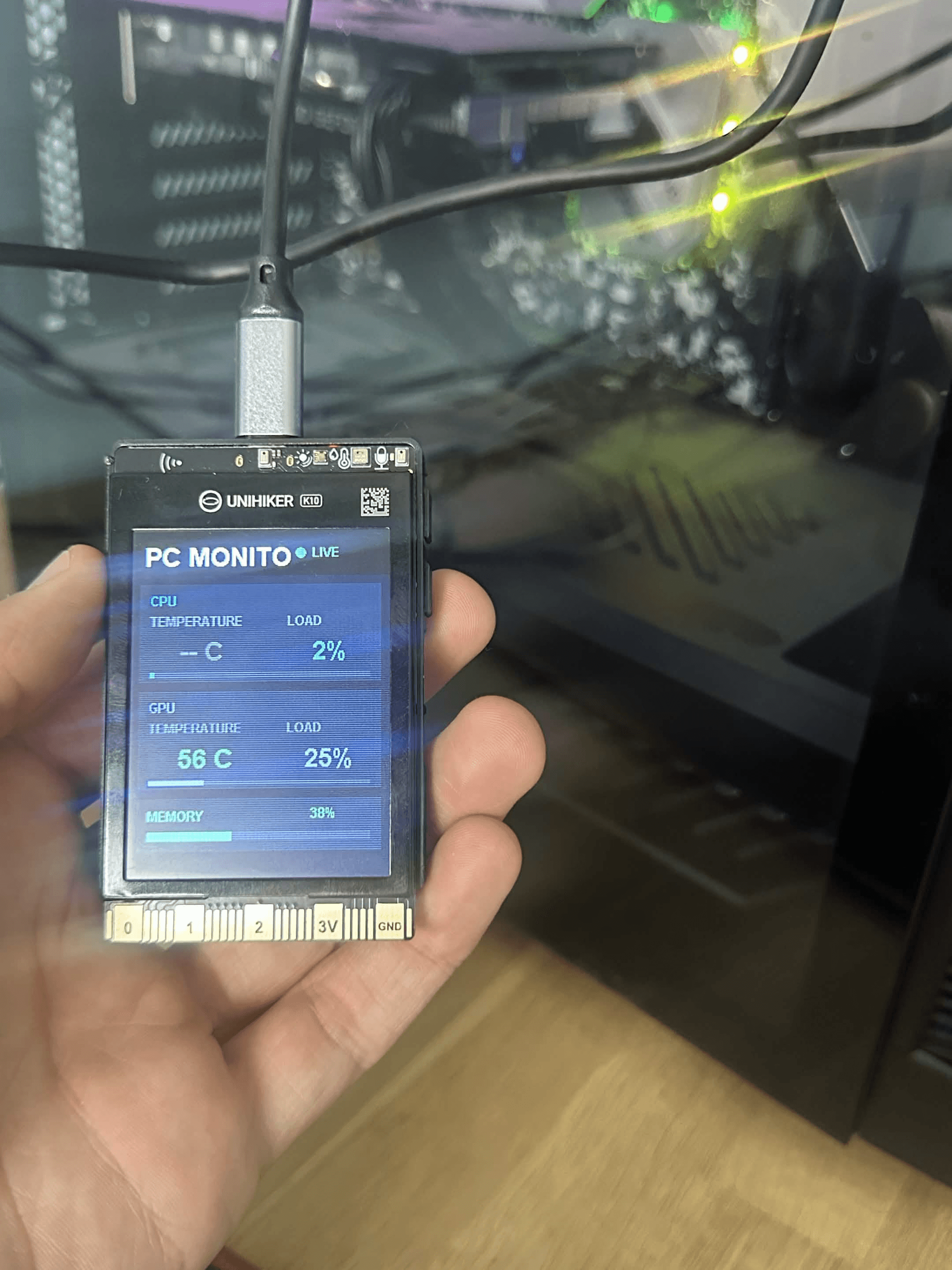 UNIHIKER K10 displaying live CPU, GPU and RAM information from a PC.