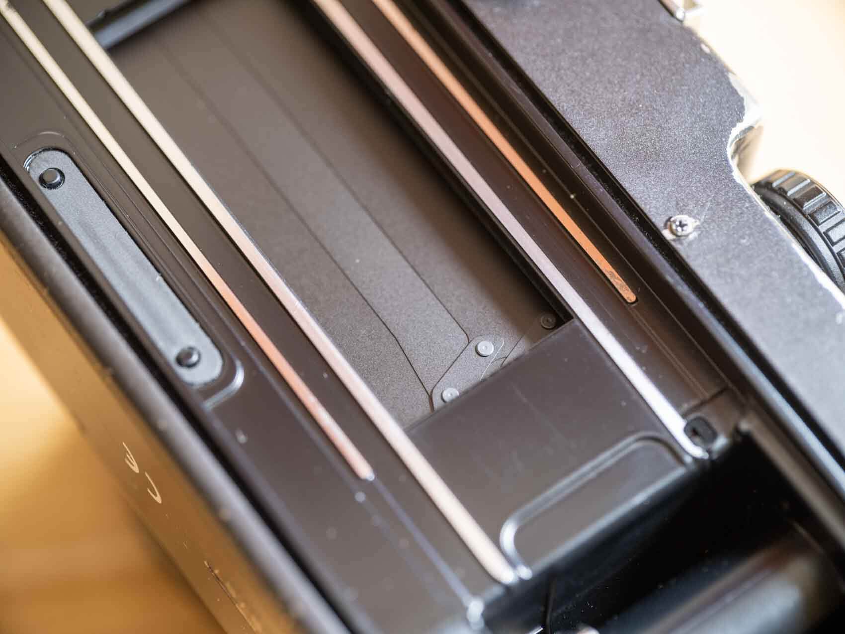 Hasselblad XPan repair showing the tiny crack in the shutter, related to the 8888 error and broken shutter curtain, which is basically impossible to see. 