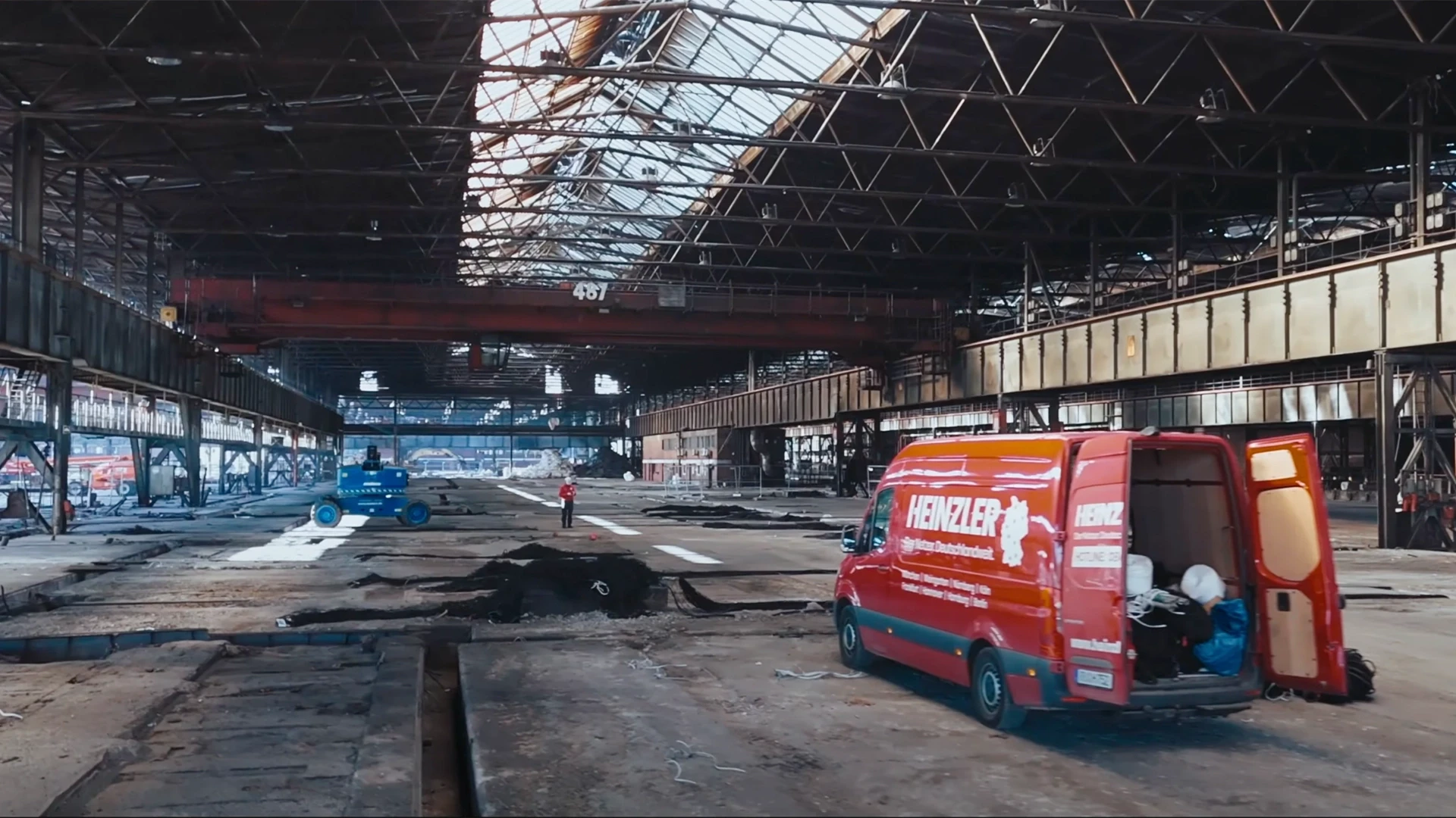 Streetside billboard with flyposters of the Batch.Works brand and illustrations