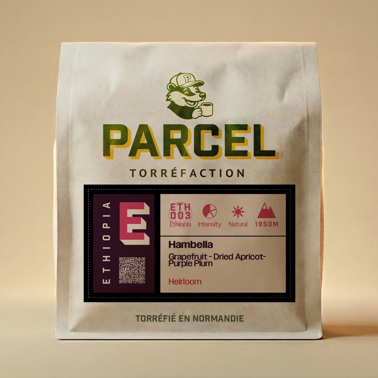 Parcel Torréfaction Ethiopia Hambella coffee bag showing tasting notes of grapefruit, dried apricot, and purple plum, made from heirloom varietal, with bag photographed upright for easy viewing by visually-impaired users.