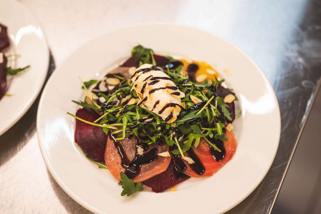 Avocado Toast with Blueberrie served in a large plate
