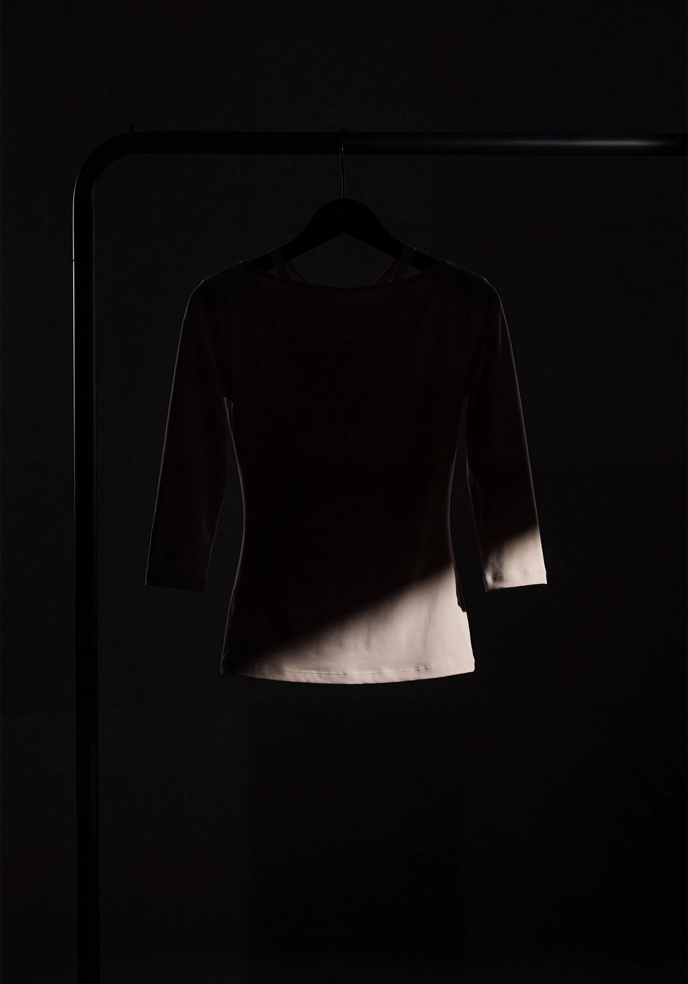 AI-assisted art direction study: cream top in directional light