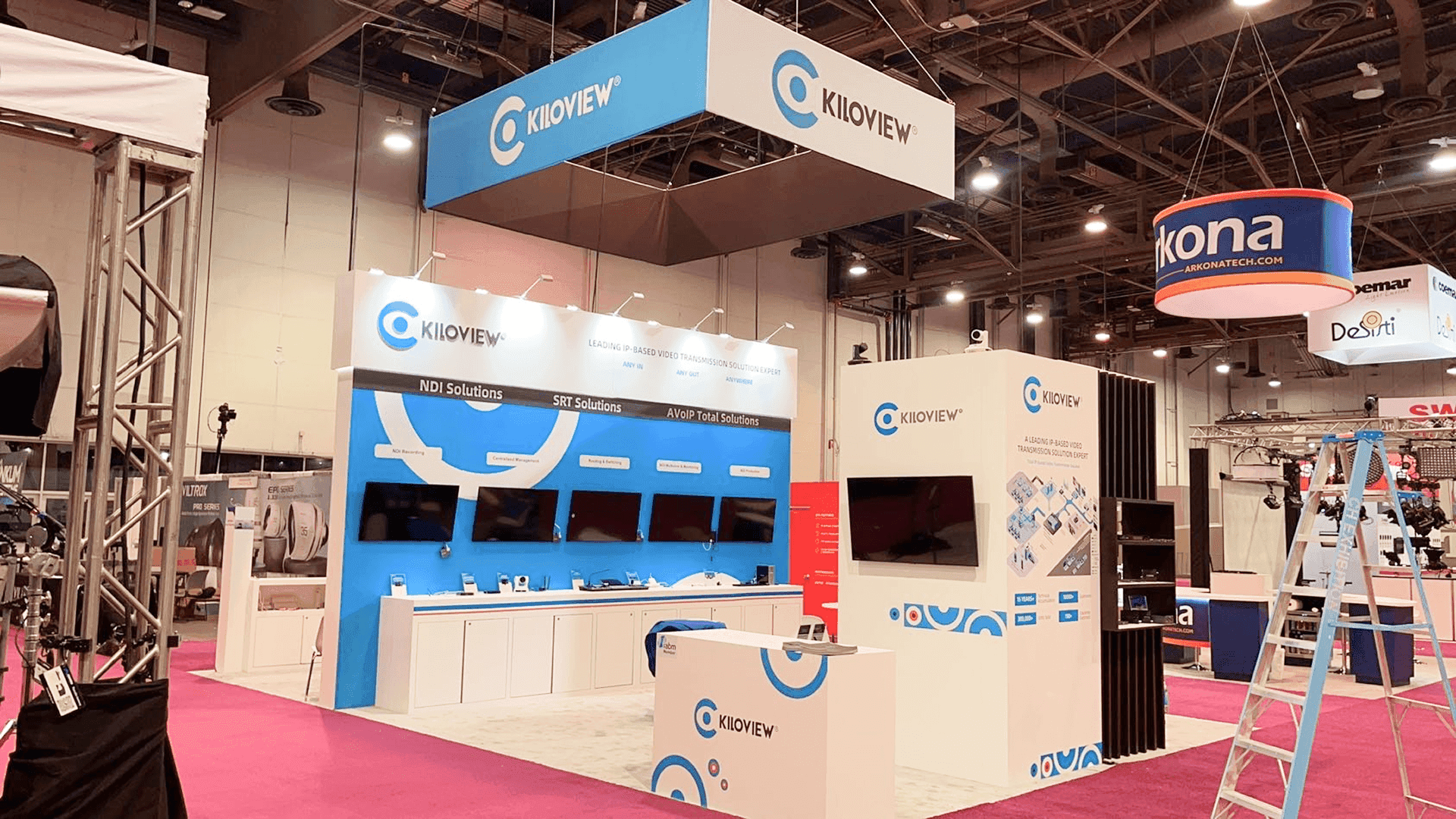 20x20 broadcast trade show booth with audio equipment display and radio system setup in Las Vegas venue