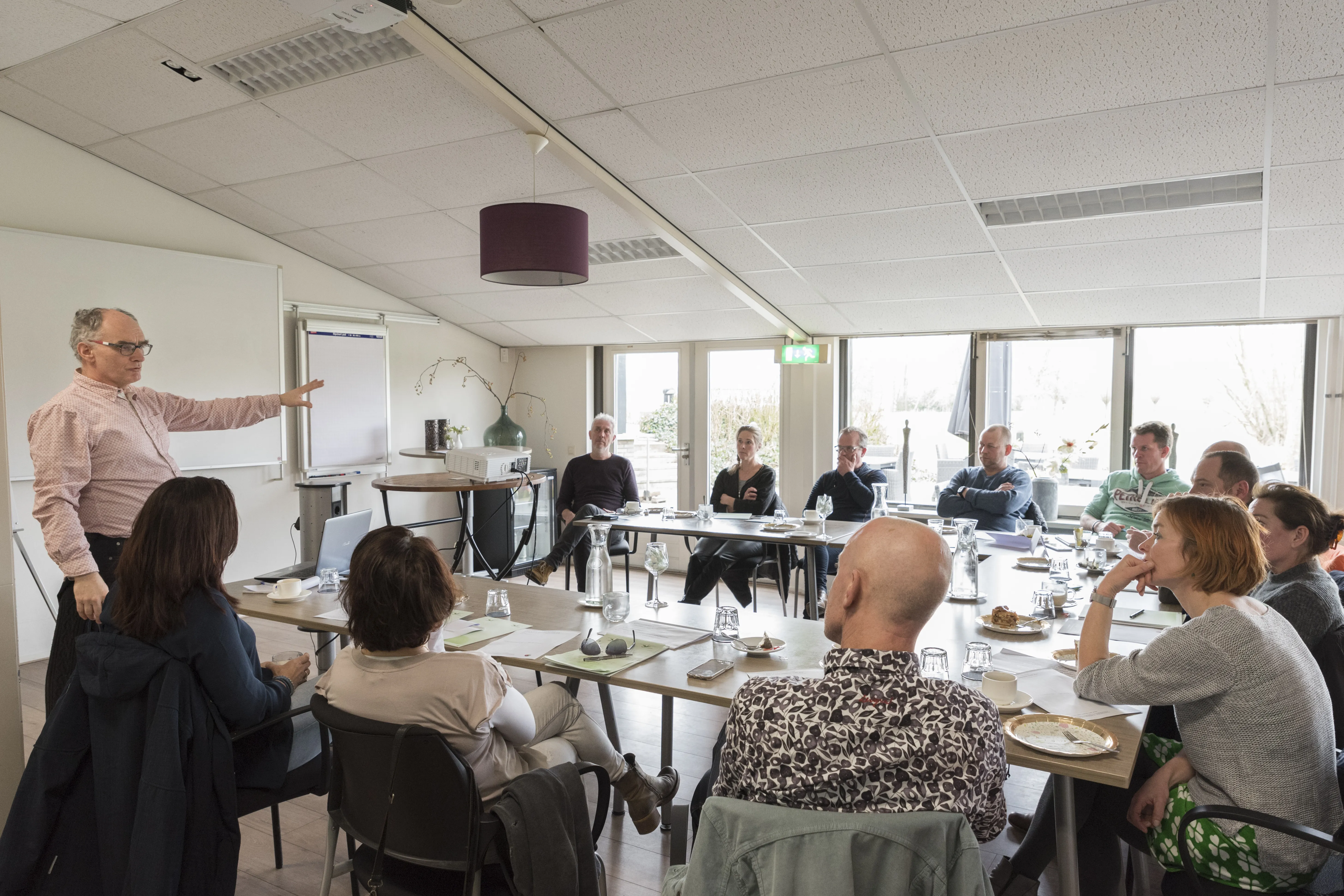 Groepsfoto van bedrijfstransitie training