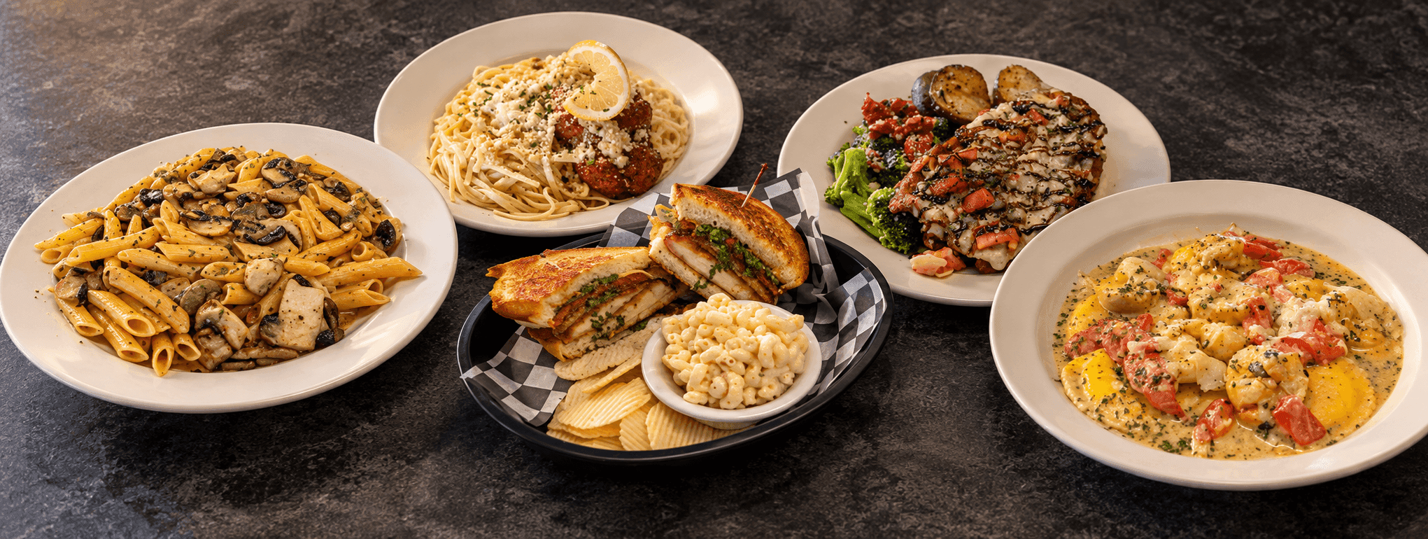 A spread of pasta dinners, entrées and a sandwich basket from Tarassa’s Italian Restaurant