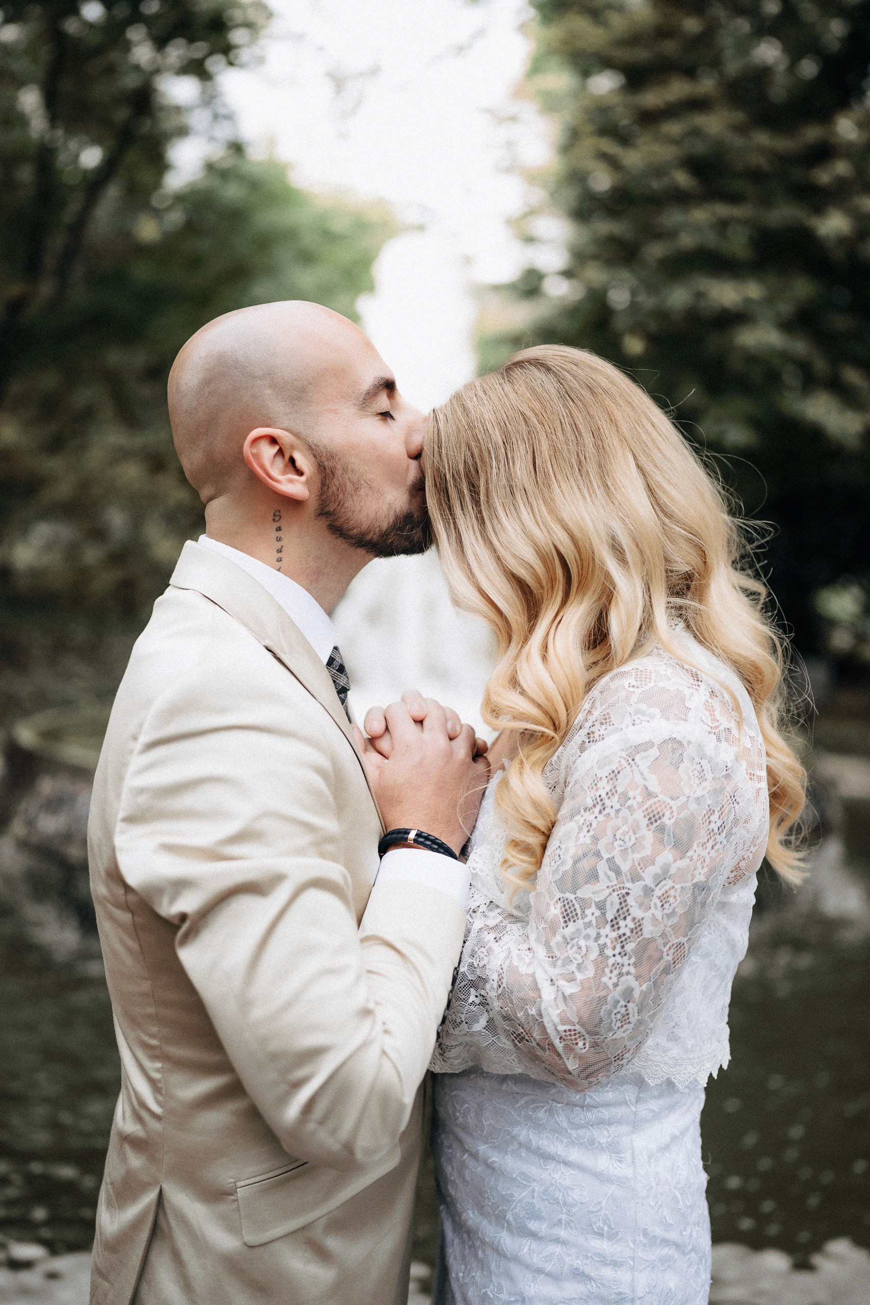 a woman holding a red flower