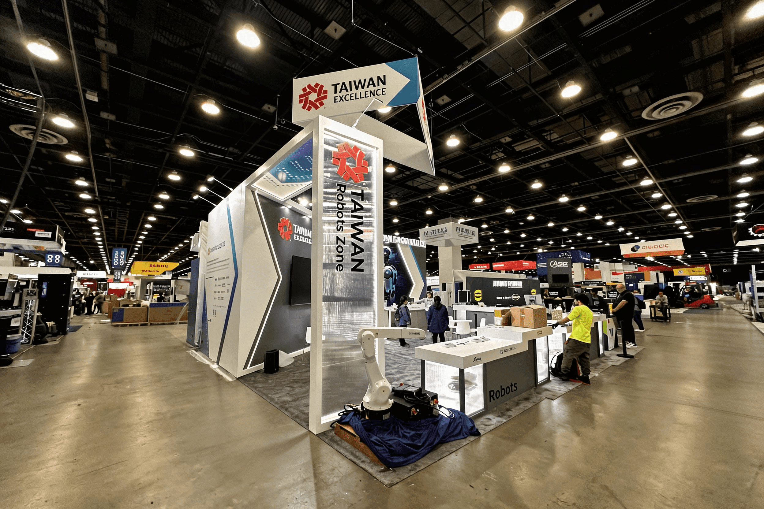 industrial engineering exhibit booth with structured demo zones for manufacturing systems and technical equipment