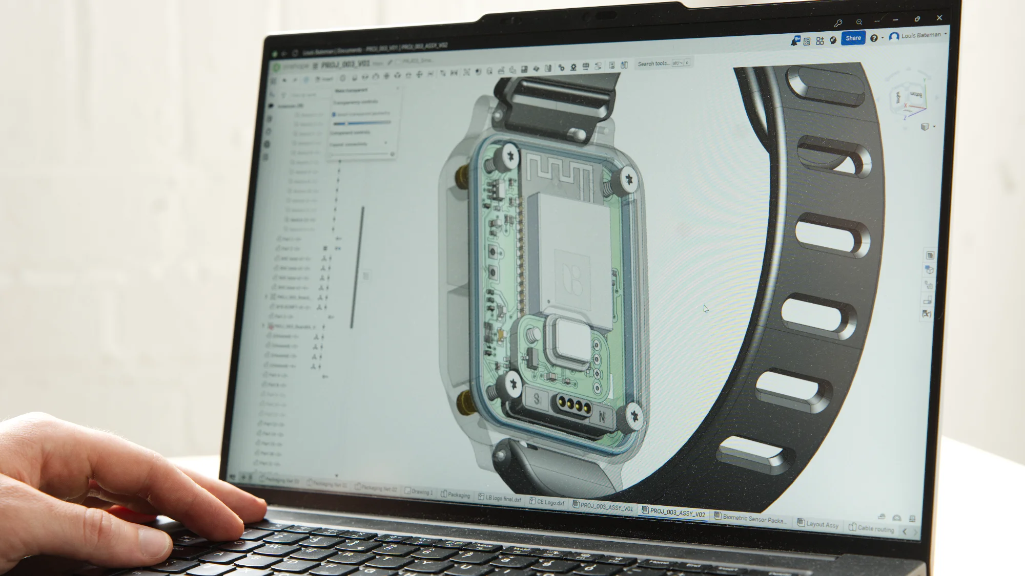 CAD development of smart wearable biometric sensor, highlighting the embedded electronics within the design.