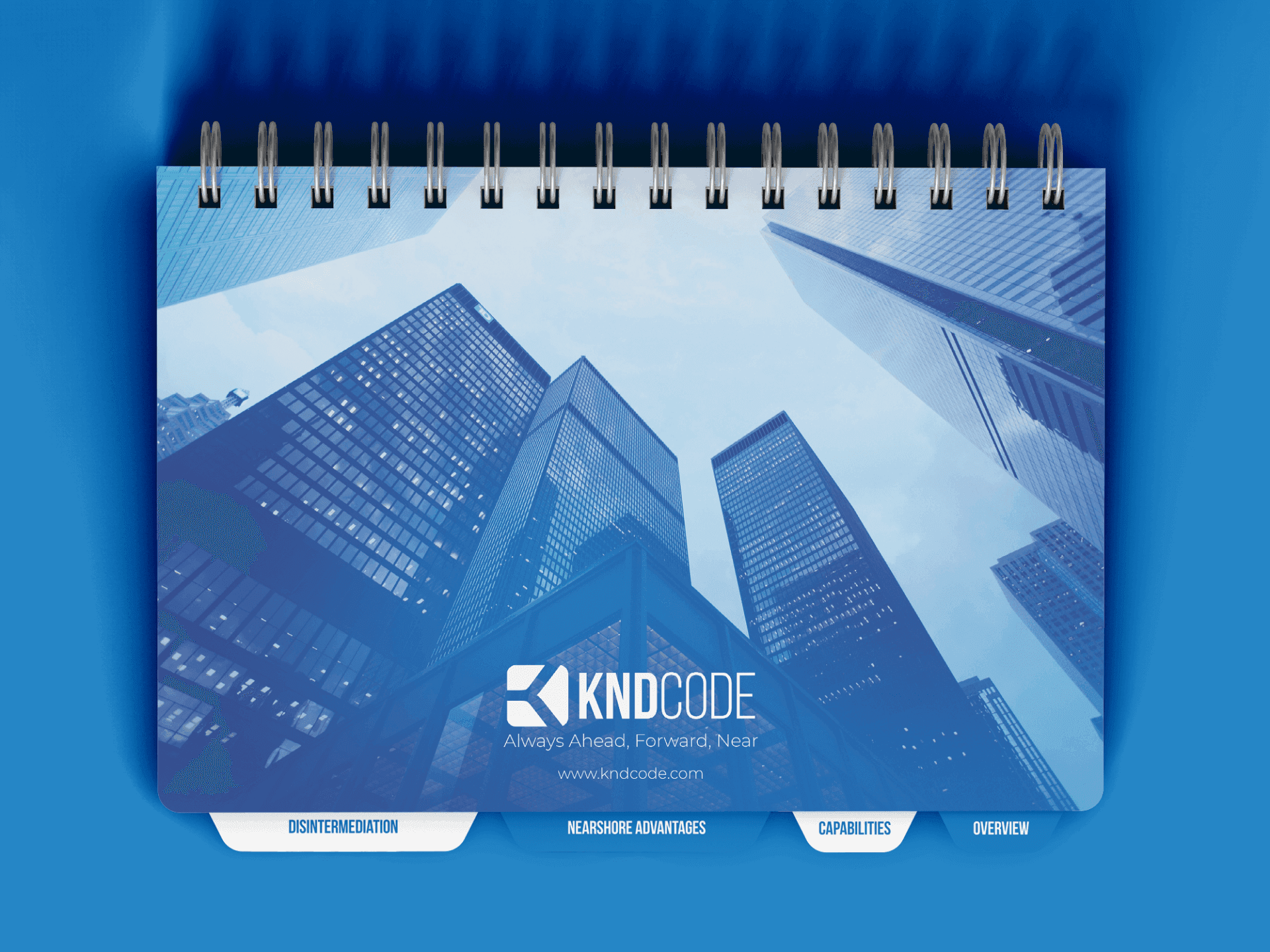 iBook cover with angular city imagery and updated KNDCode branding.
