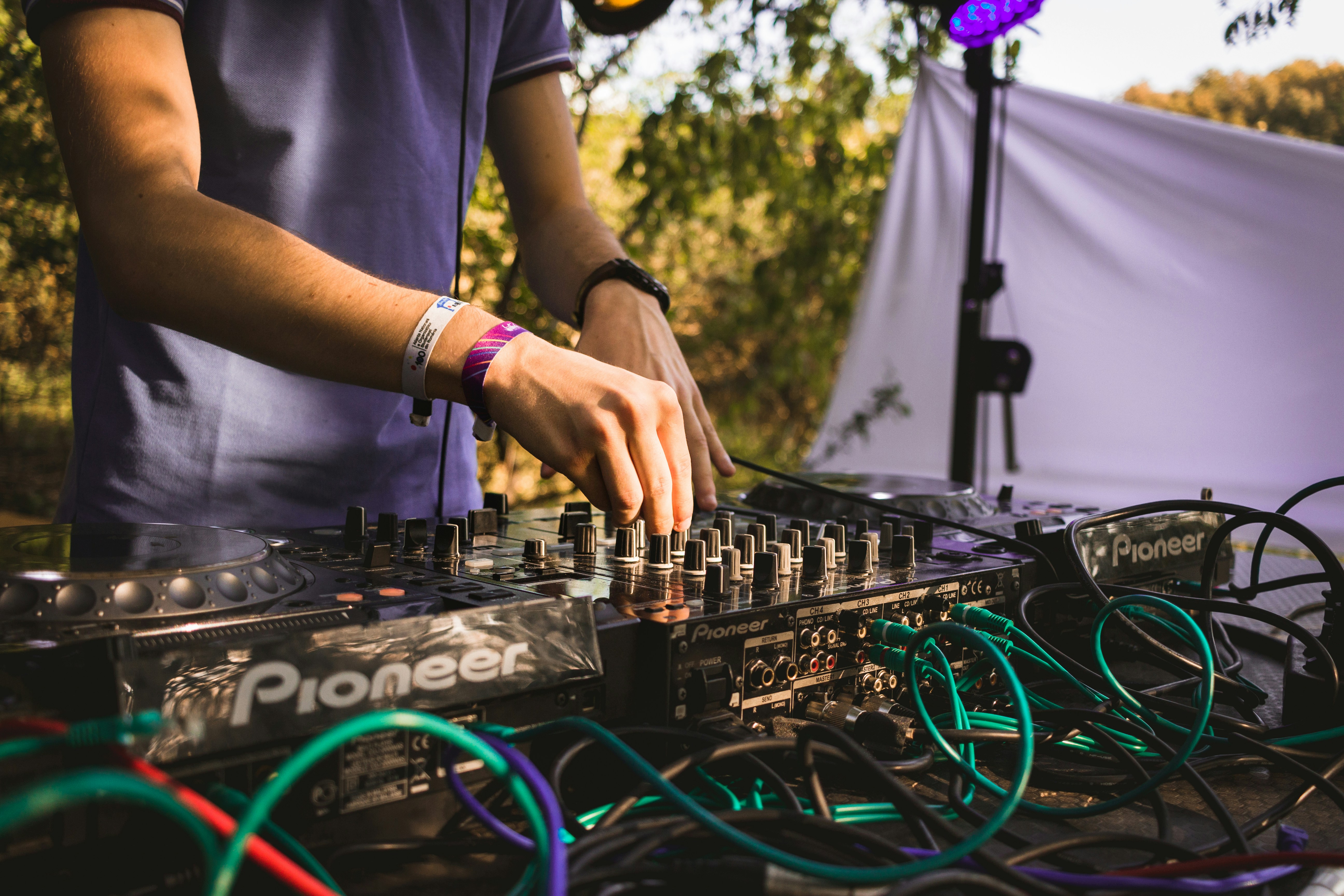 man setting up music - Music Making Equipment For Beginners