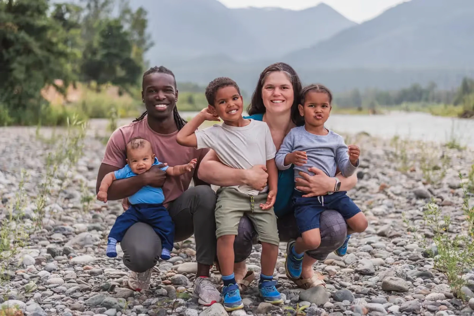 Family photographed together outdoors for Seek Optimal