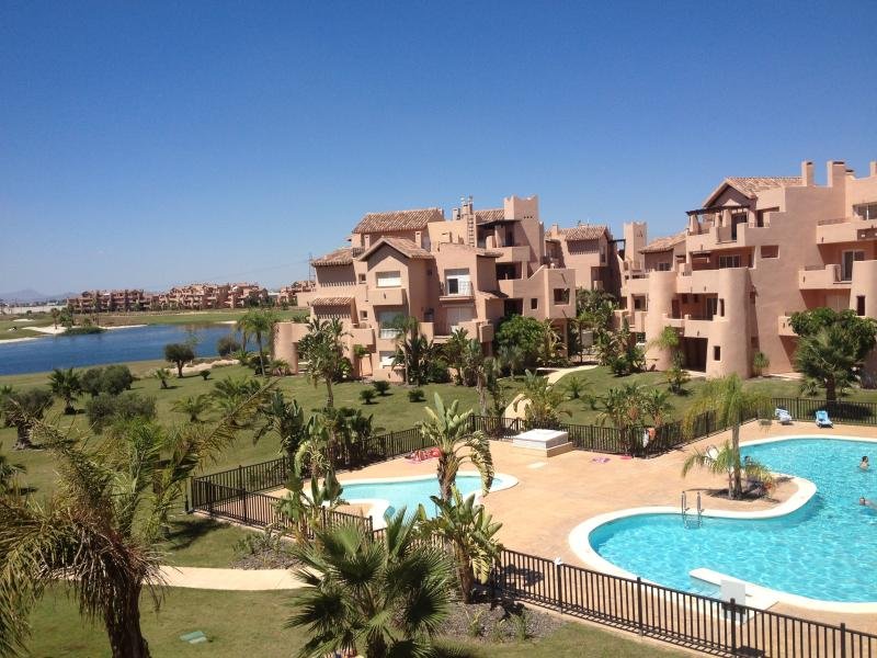 beige couch and armchair