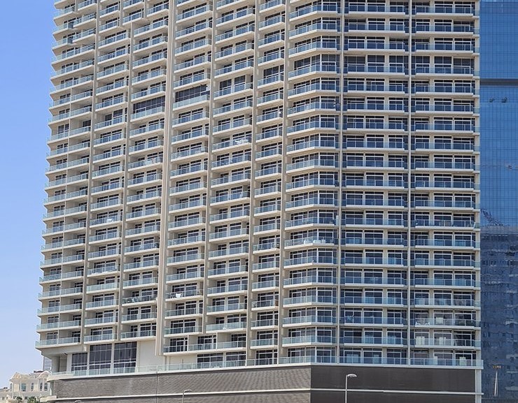 Modern architecture of Zaya Hameni tower. Specialist real estate guidance for luxury Dubai living.