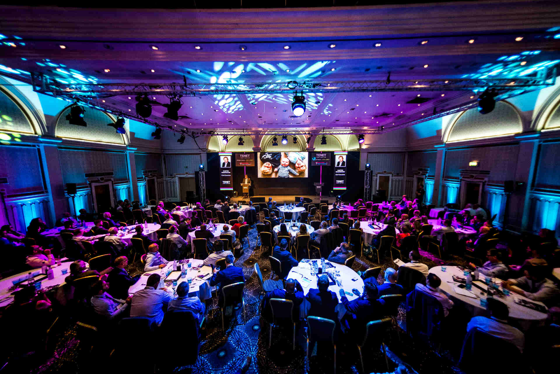 image of corporate event indoor colorful lights
