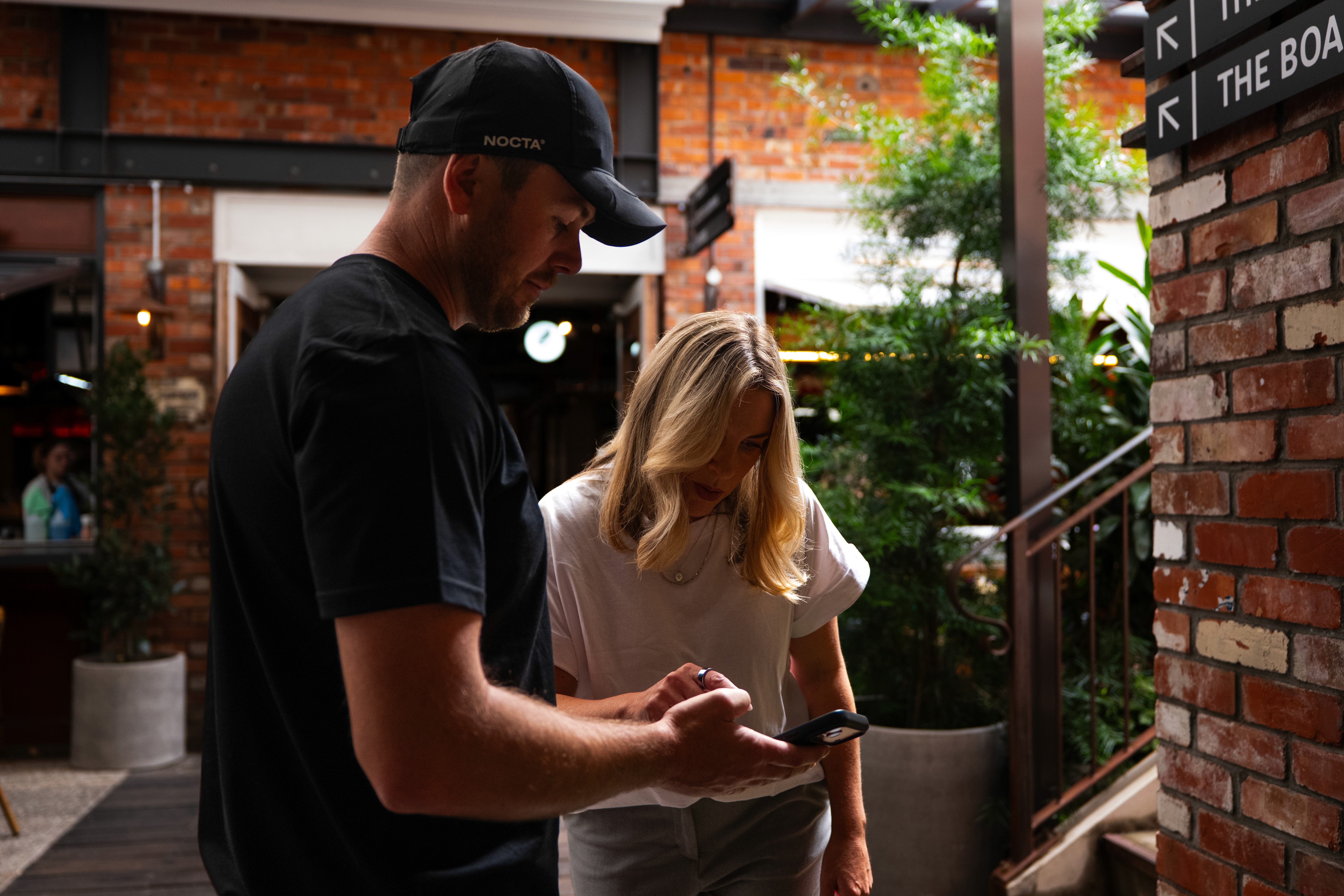 black and brown leather padded tub sofa