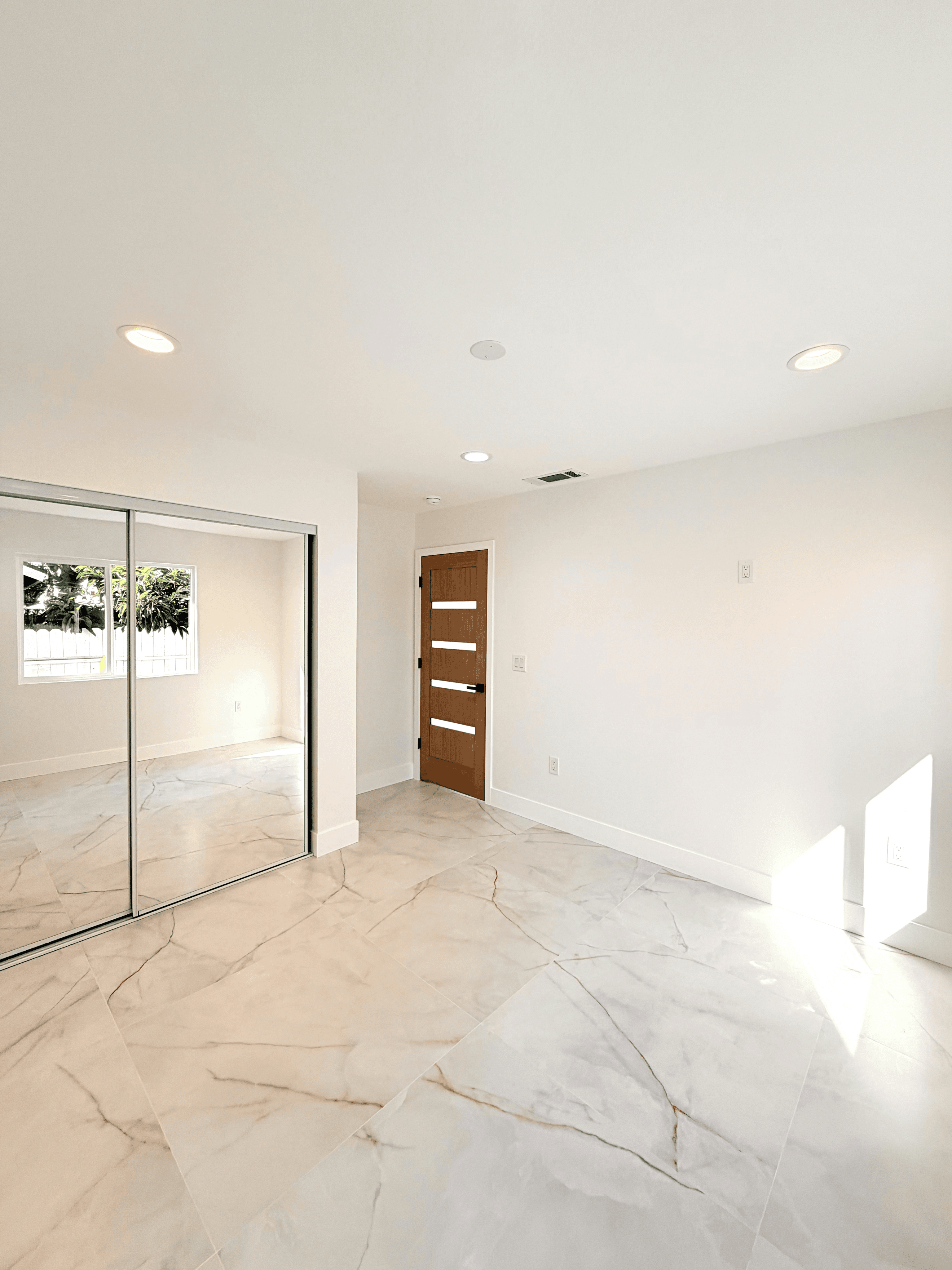 Open-concept living room in 3 bedroom ADU – THP Construction